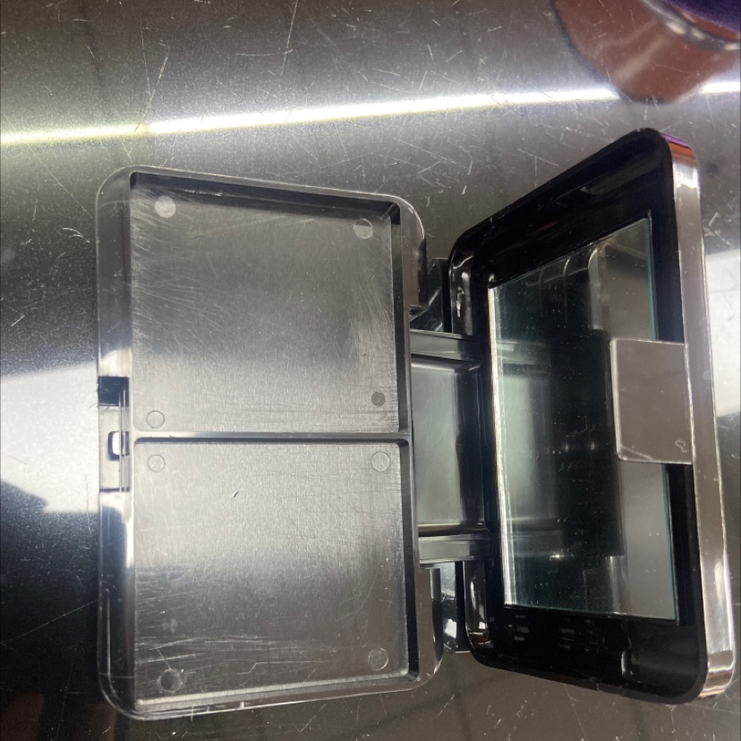 The cosmetic box is black