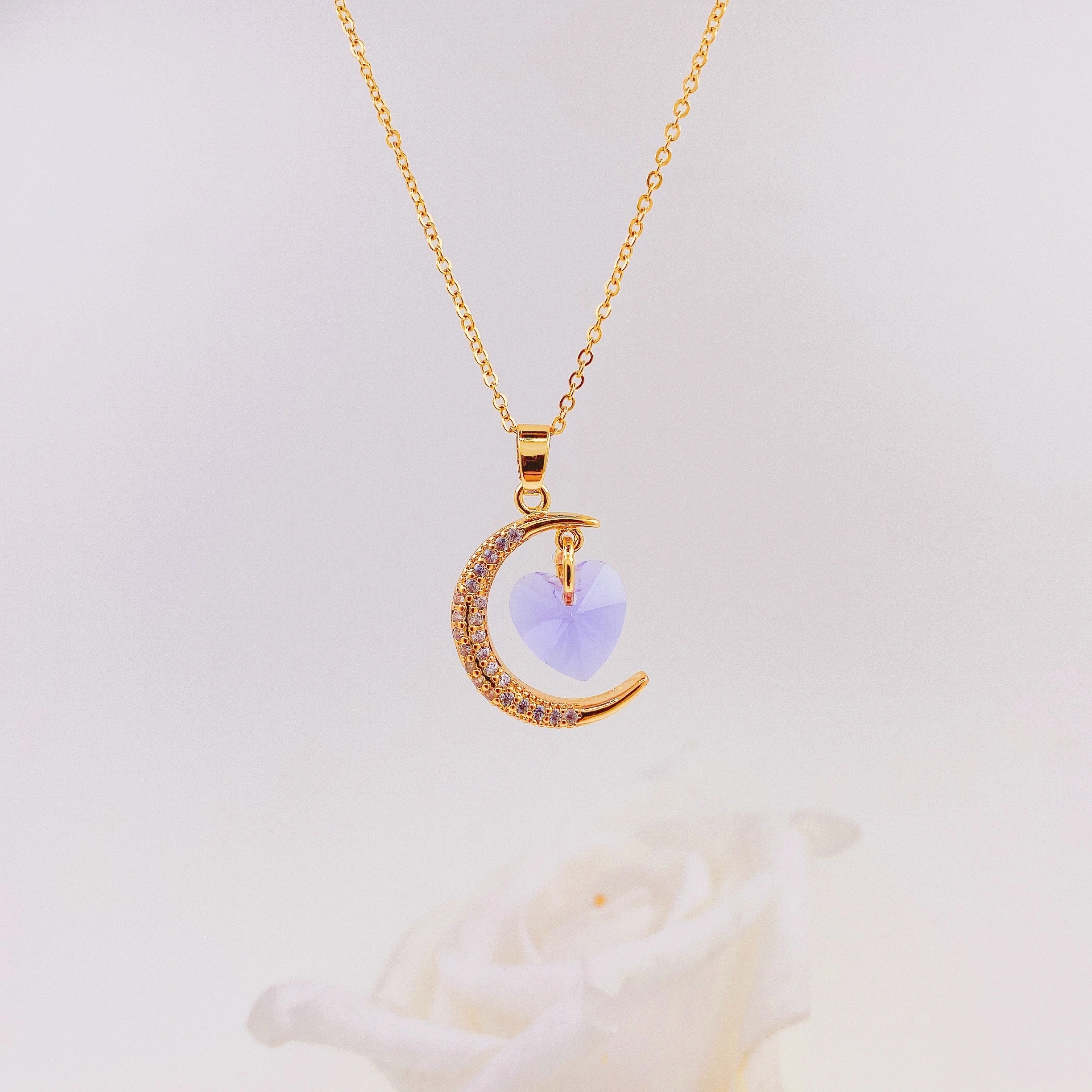 A titanium steel necklace of the same style as Douyin, with a touch of light luxury and a moon heart pendant. It features an ins style and an extremely ethereal design. (Single pendant without chain) detail image 2