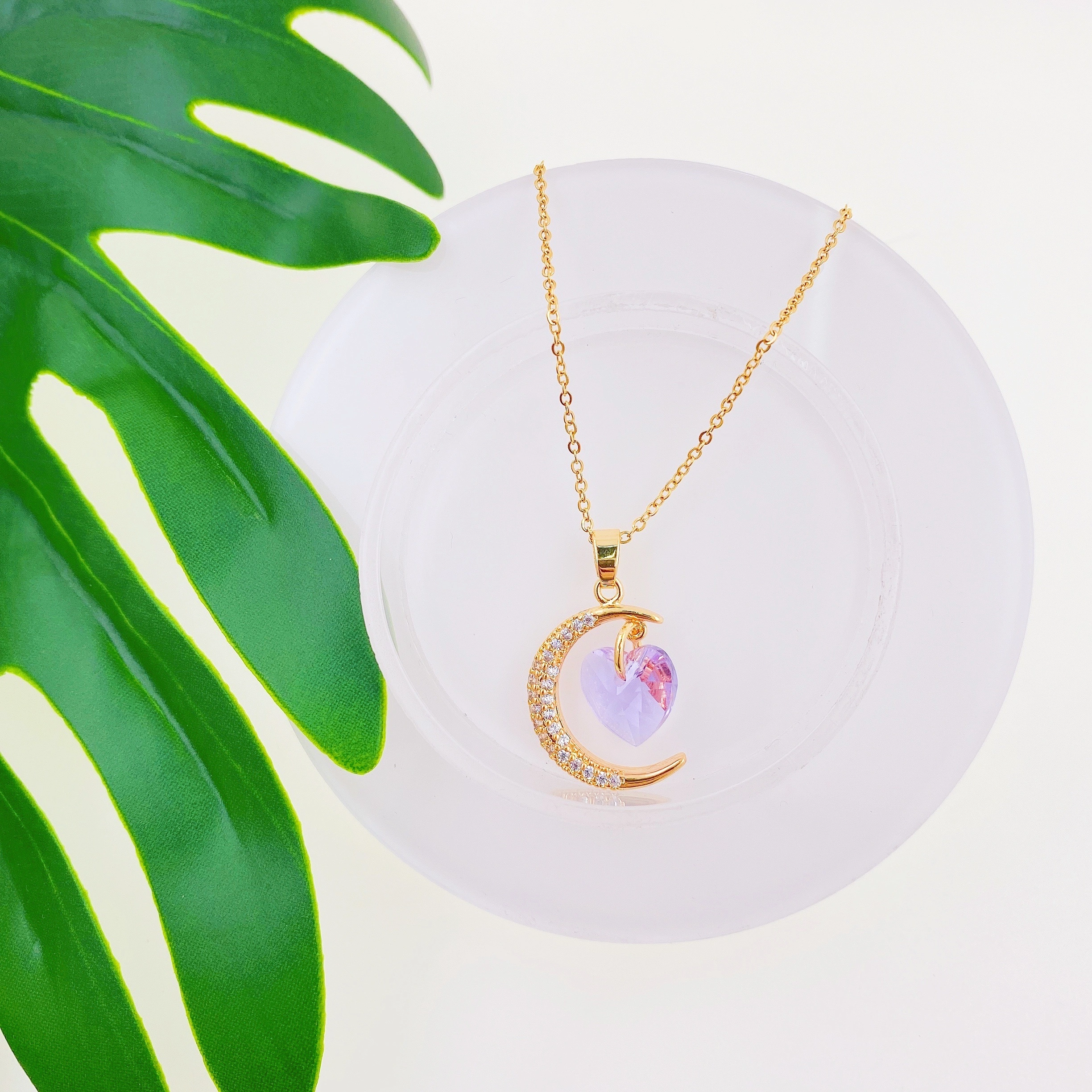 A titanium steel necklace of the same style as Douyin, with a touch of light luxury and a moon heart pendant. It features an ins style and an extremely ethereal design. (Single pendant without chain) detail image 4