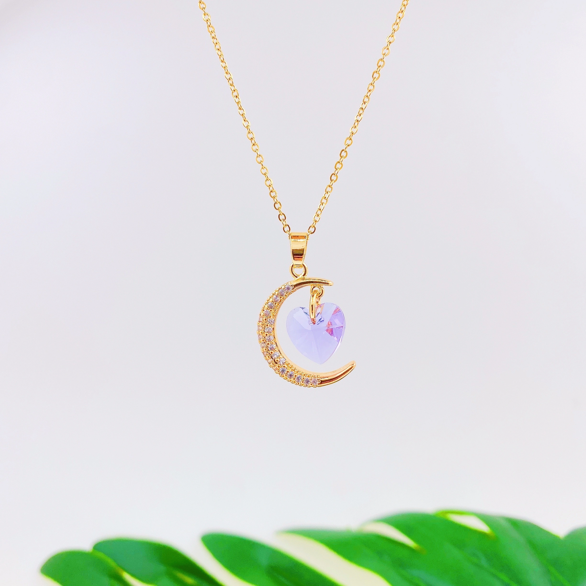 A titanium steel necklace of the same style as Douyin, with a touch of light luxury and a moon heart pendant. It features an ins style and an extremely ethereal design. (Single pendant without chain) detail image 1