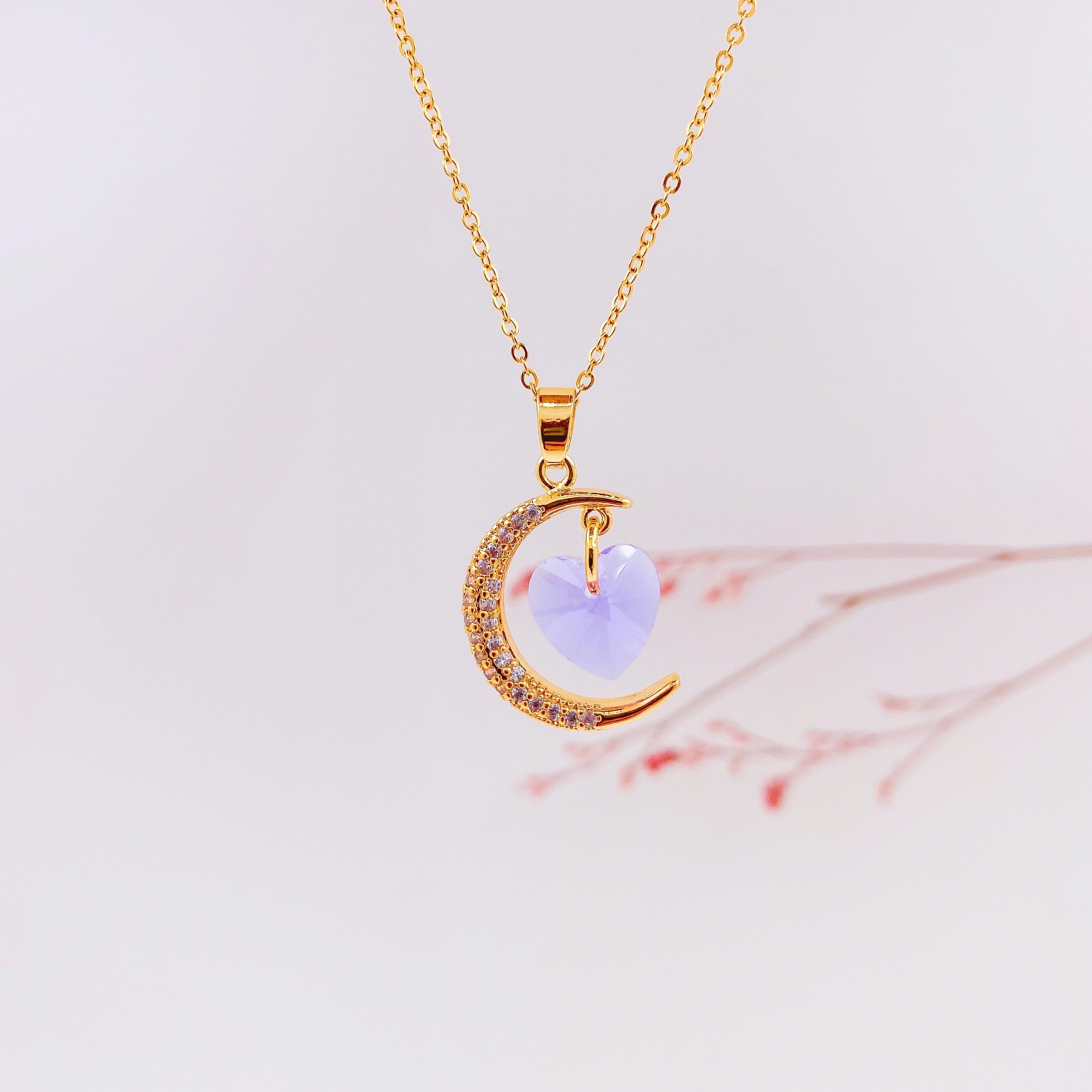 A titanium steel necklace of the same style as Douyin, with a touch of light luxury and a moon heart pendant. It features an ins style and an extremely ethereal design. (Single pendant without chain) detail image 3