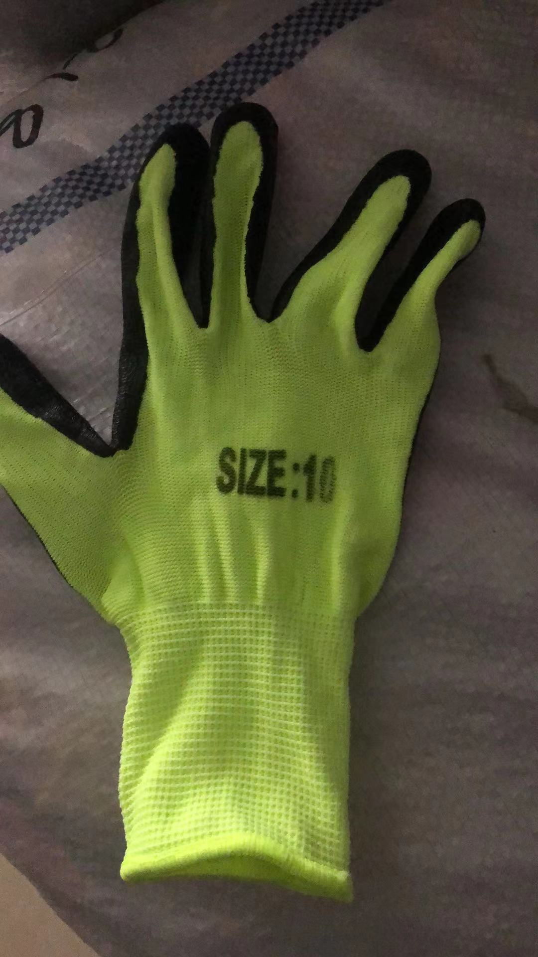 Green yarn black rubber gloves