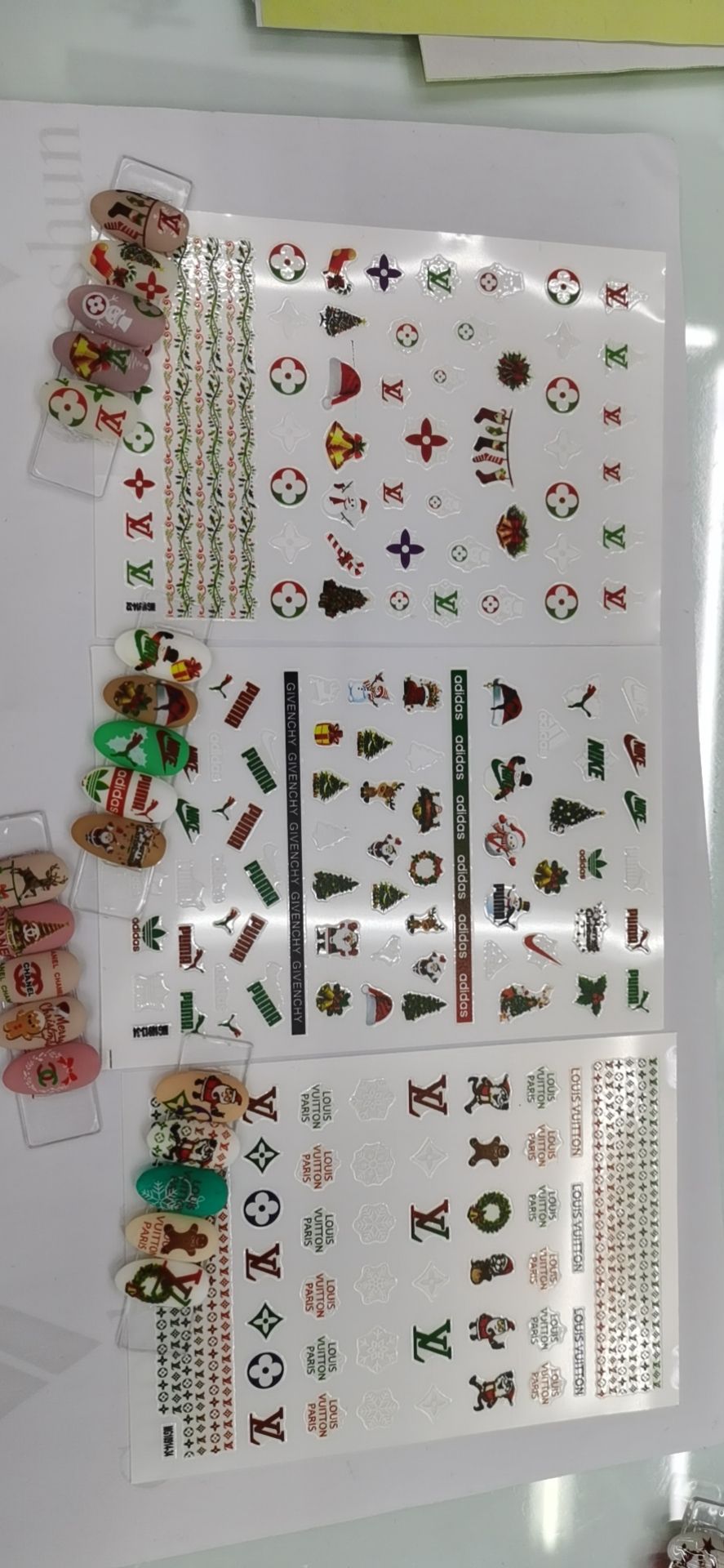 MG process ins nail stickers with adhesive backing have good adhesion, strong realism, very clear patterns, and a wide variety of styles. Factory direct sales of thin and tough new process adhesive stickers with many styles details Picture