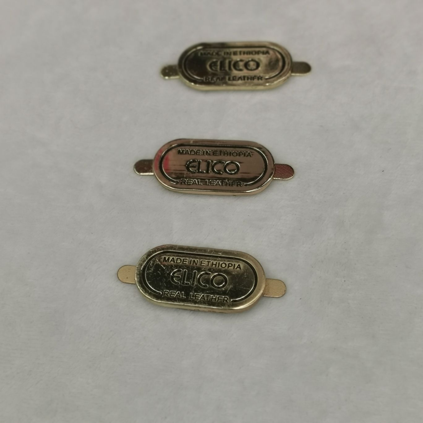 服装皮袢五金饰品  帽子饰品皮扣  风衣和大衣服装皮扣  帽子和鞋类五金扣子