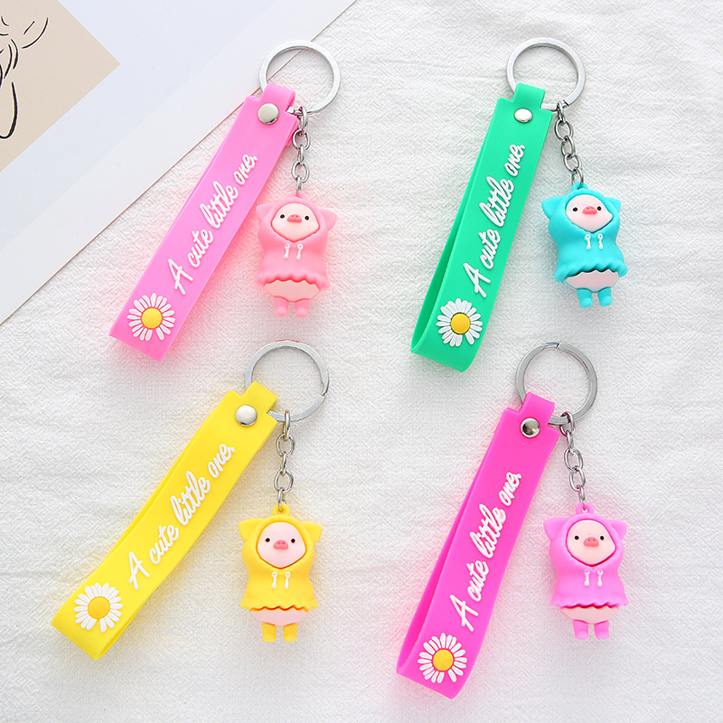 New PVC creative and cute cartoon raincoat pig keychain pendant, fashionable and trendy couple key chain accessory detail image 1