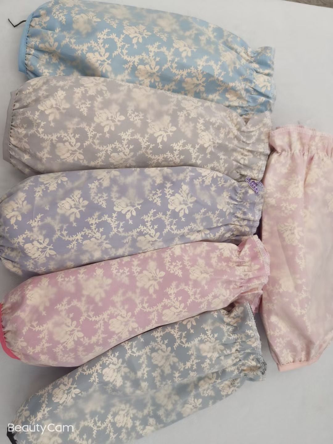 Winter waterproof sleeve covers are available in various colors and styles. Long oil-proof and stain-resistant sleeves for women