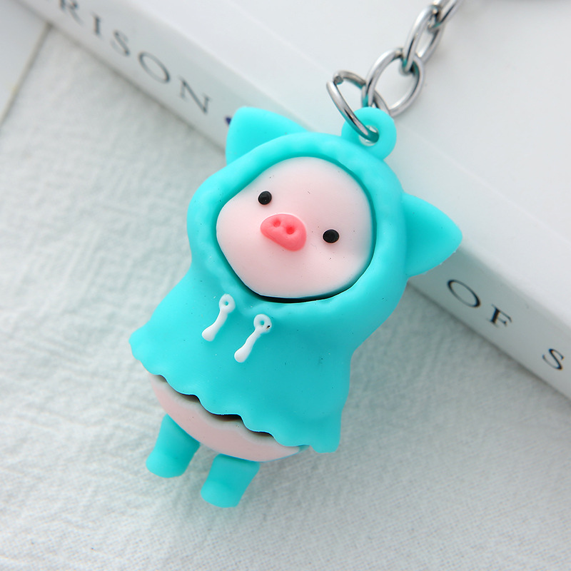 New PVC creative and cute cartoon raincoat pig keychain pendant, fashionable and trendy couple key chain accessory detail image 4