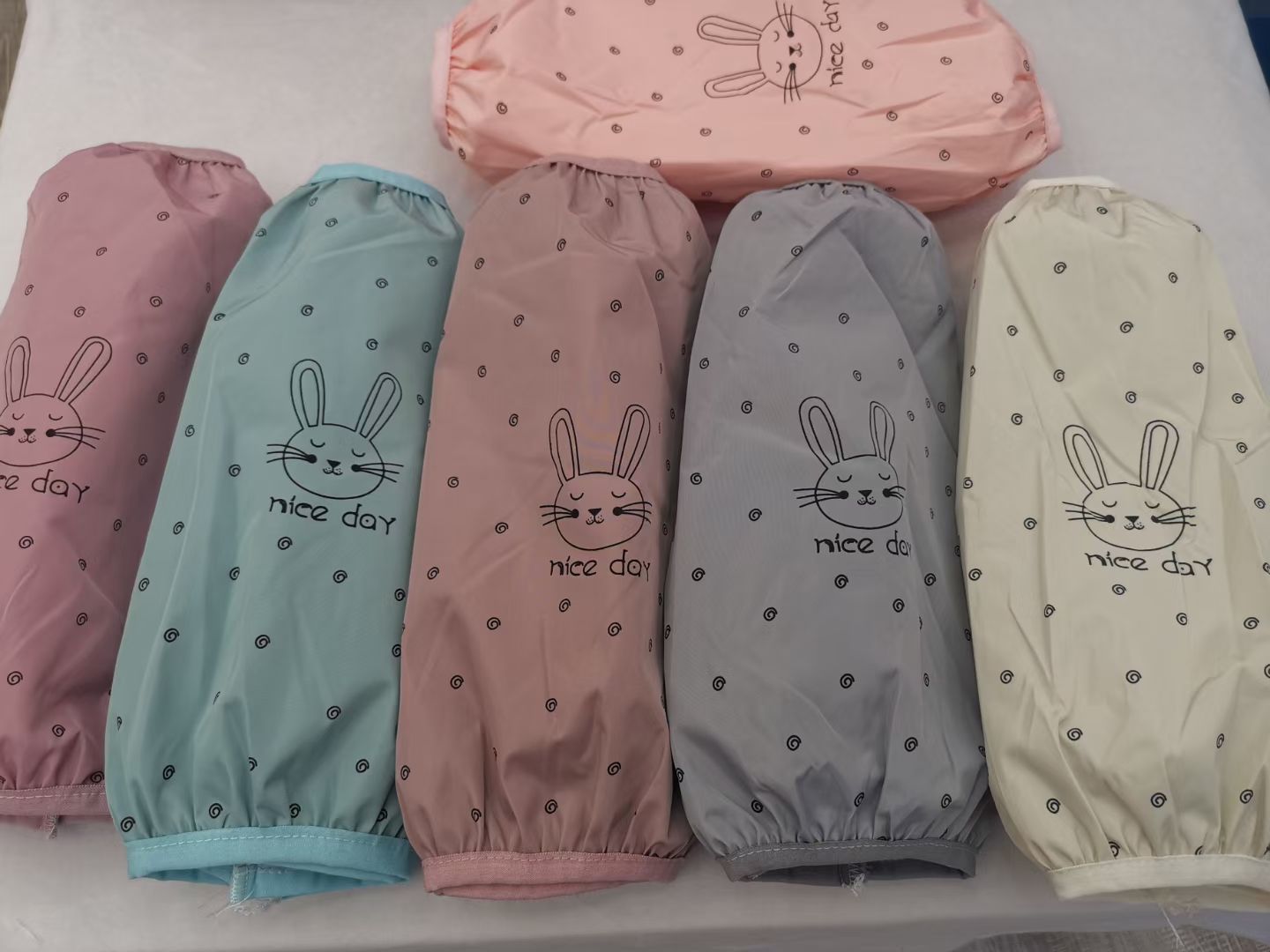 Winter waterproof sleeve covers are available in various colors and styles. Long oil-proof and stain-resistant sleeves for women