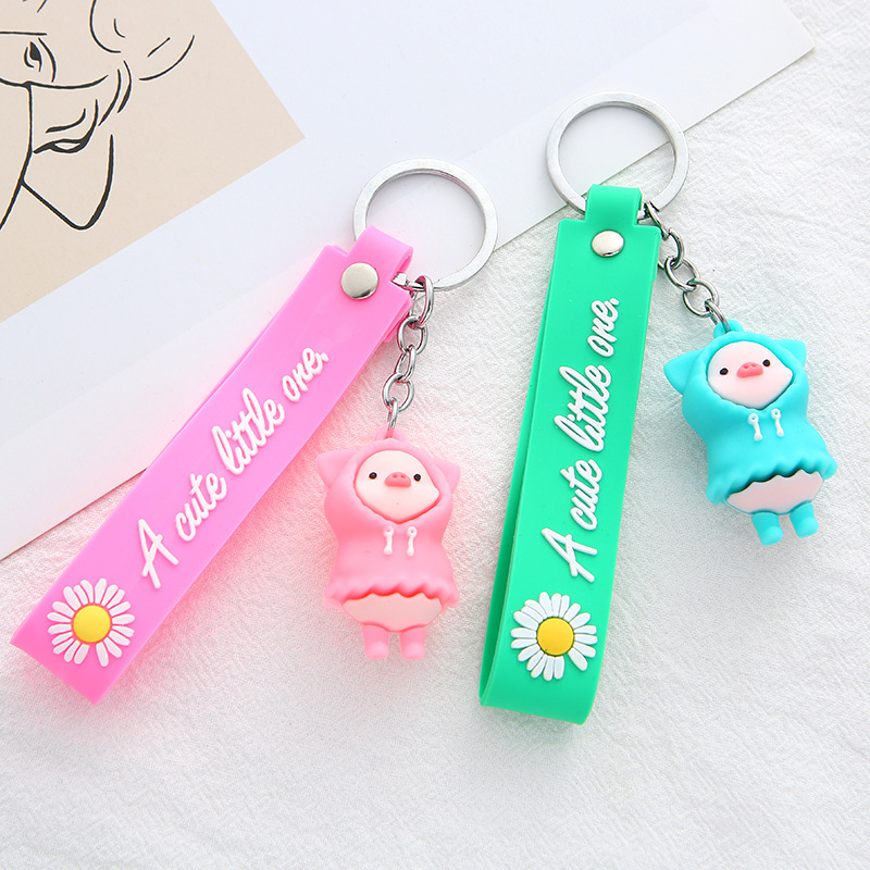 New PVC creative and cute cartoon raincoat pig keychain pendant, fashionable and trendy couple key chain accessory details Picture