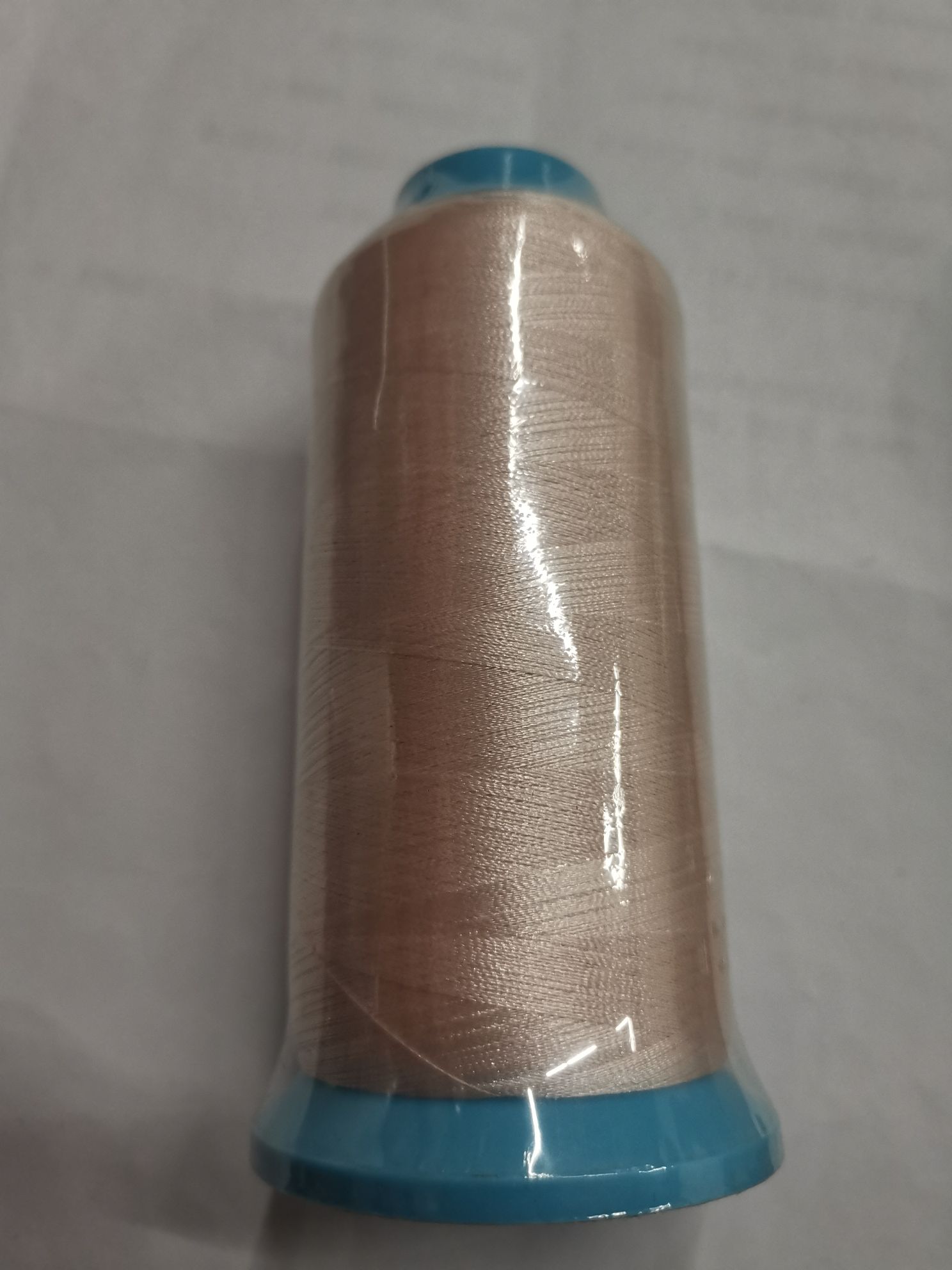 Apricot-colored embroidery thread details Picture