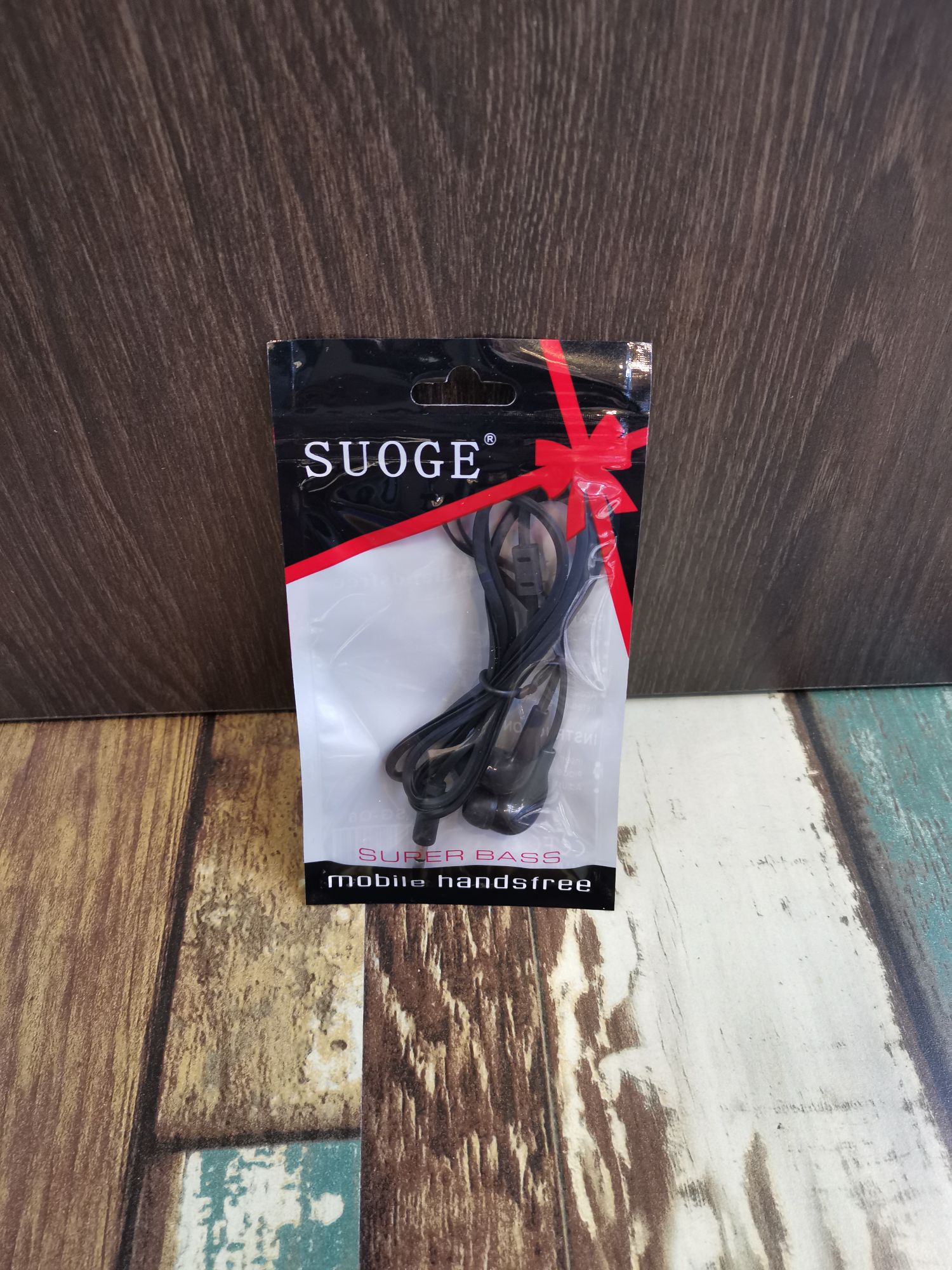 Guangdong sogo marca bolsas auriculares de teléfono móvil auriculares en el oído auriculares de grano MP3 auriculares con cable auriculares pequeños moda creativa boutique