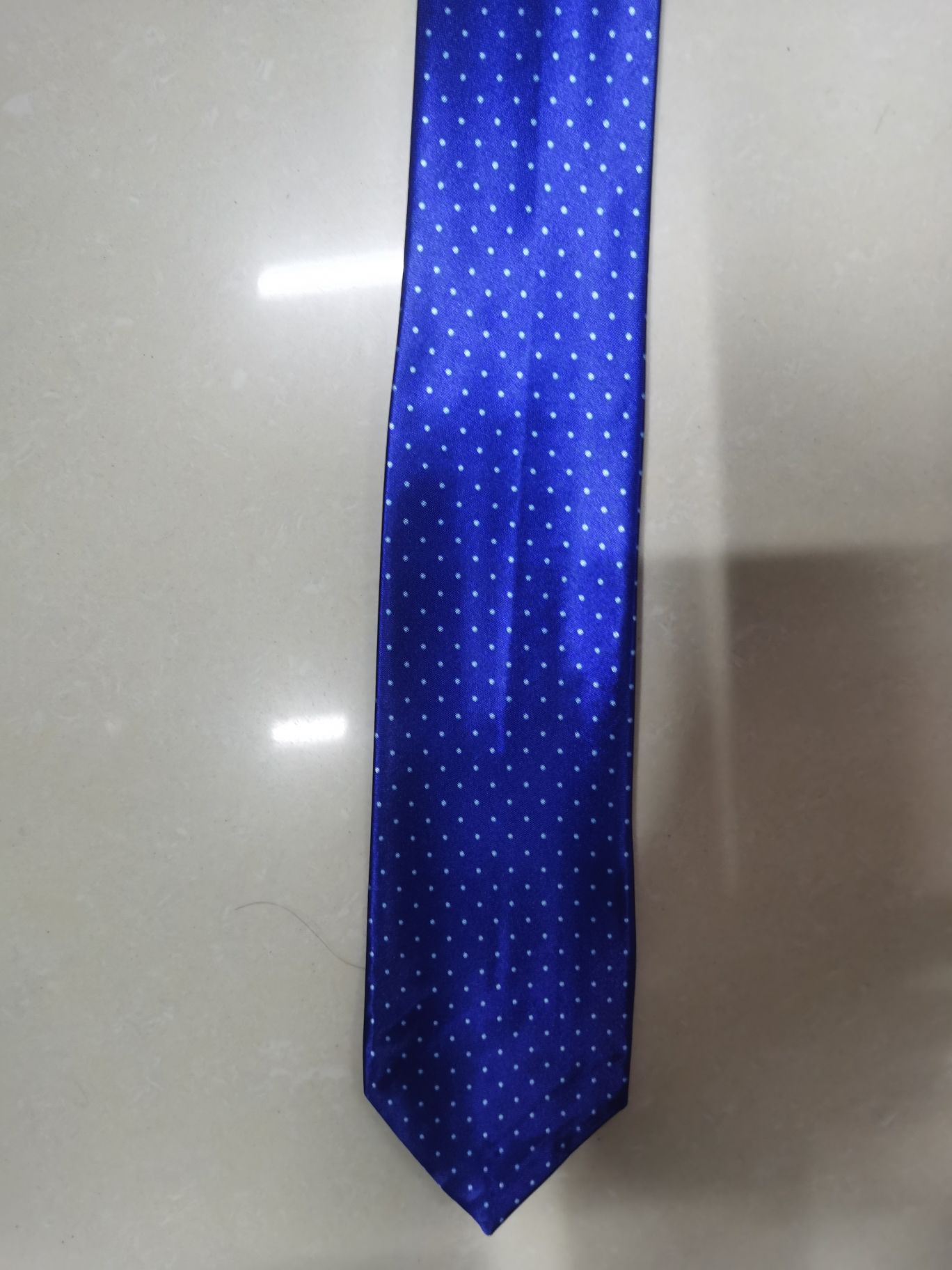 A 6-centimeter large-headed tie made of synthetic fiber in one color Specification image