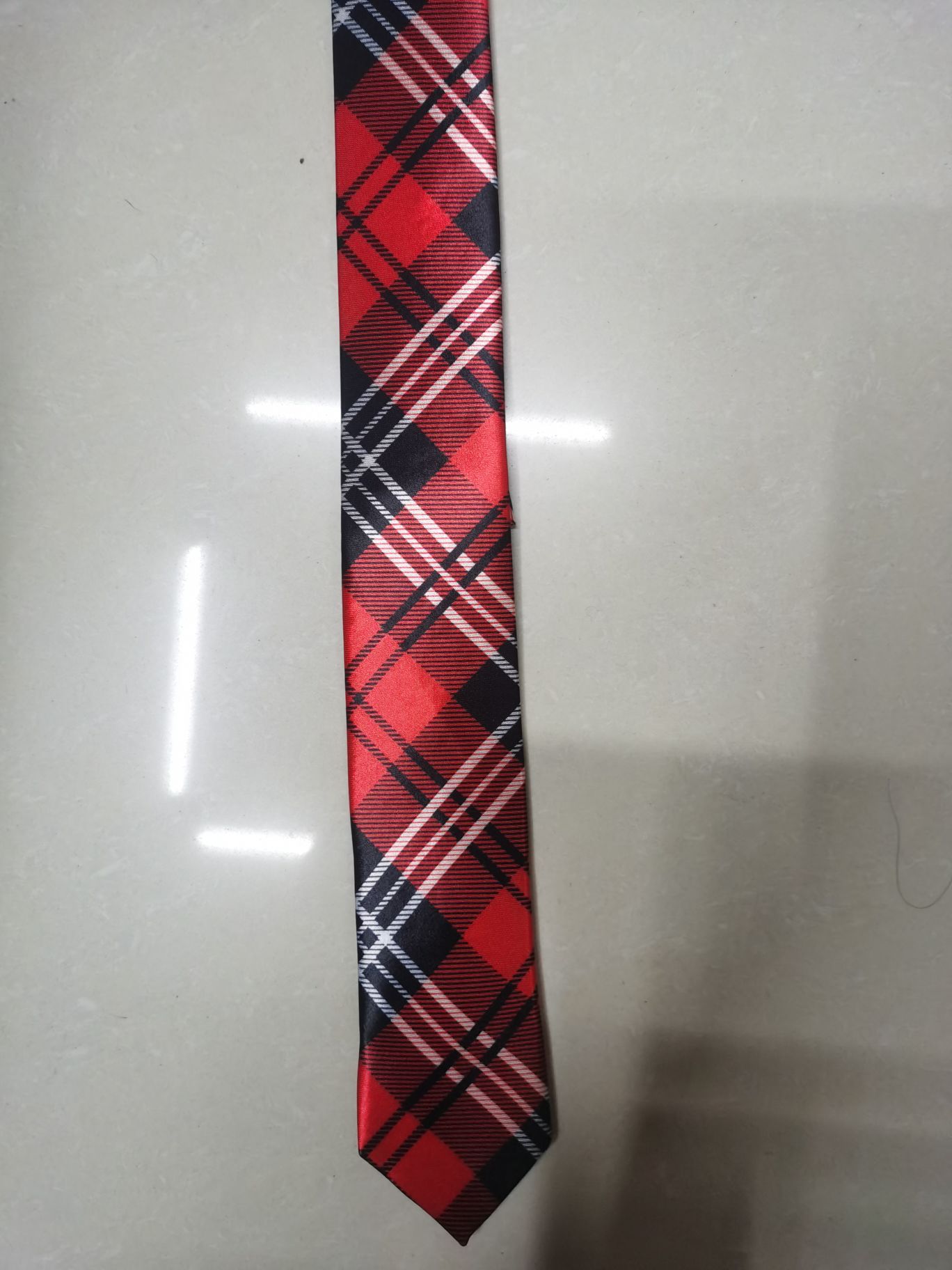 Red tie with chemical fiber transfer printing Specification image