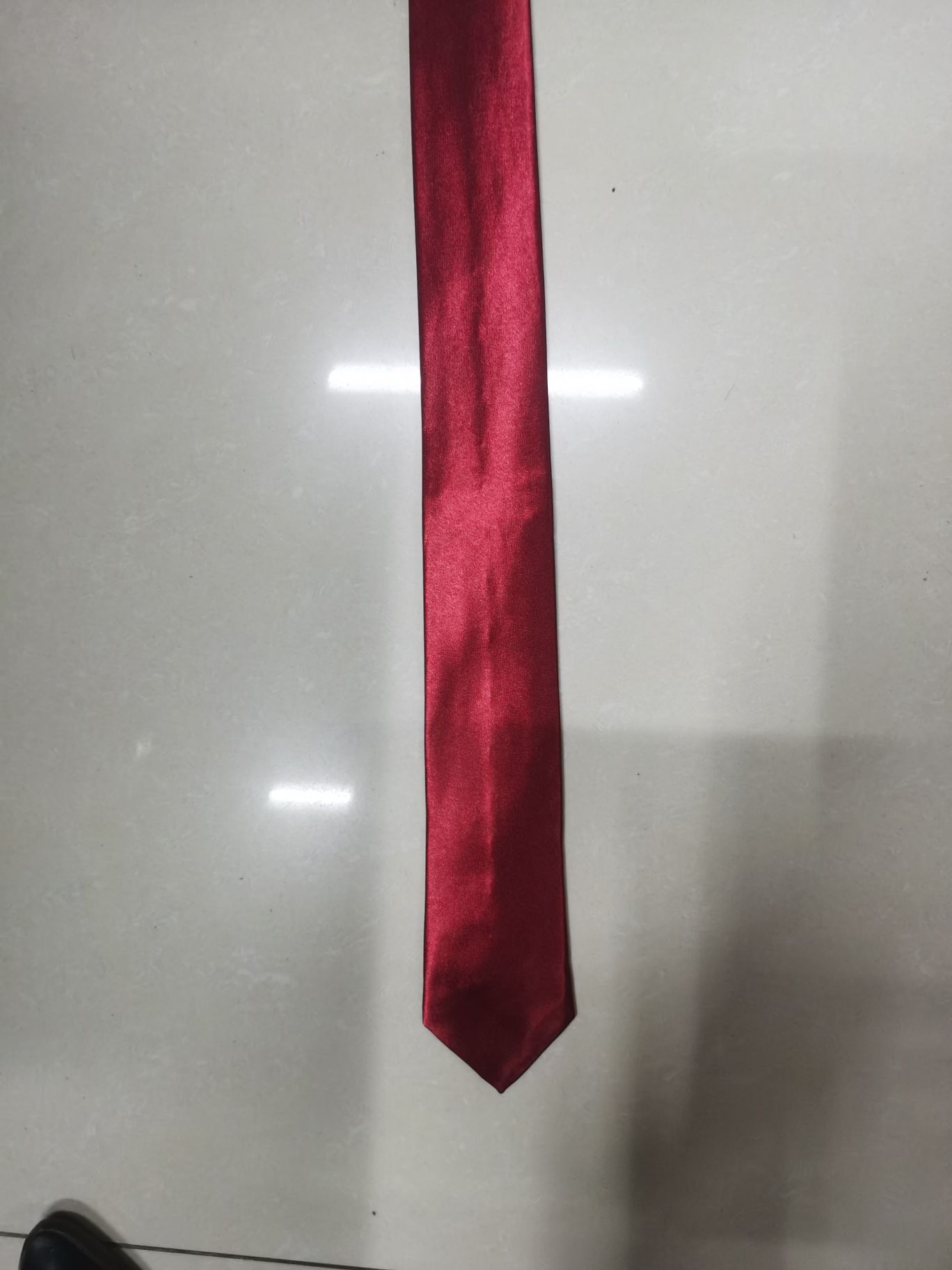 A grey tie dyed with chemical fibers Specification image