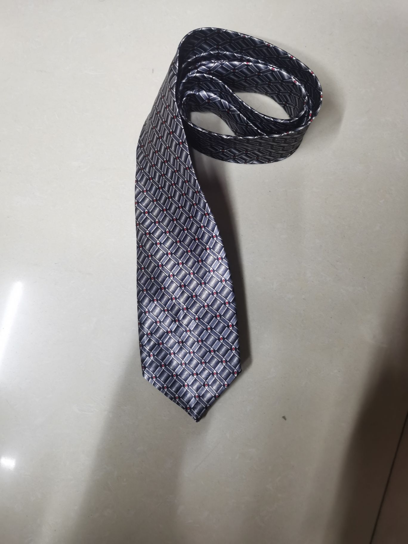 化纤转移印花灰小格领带