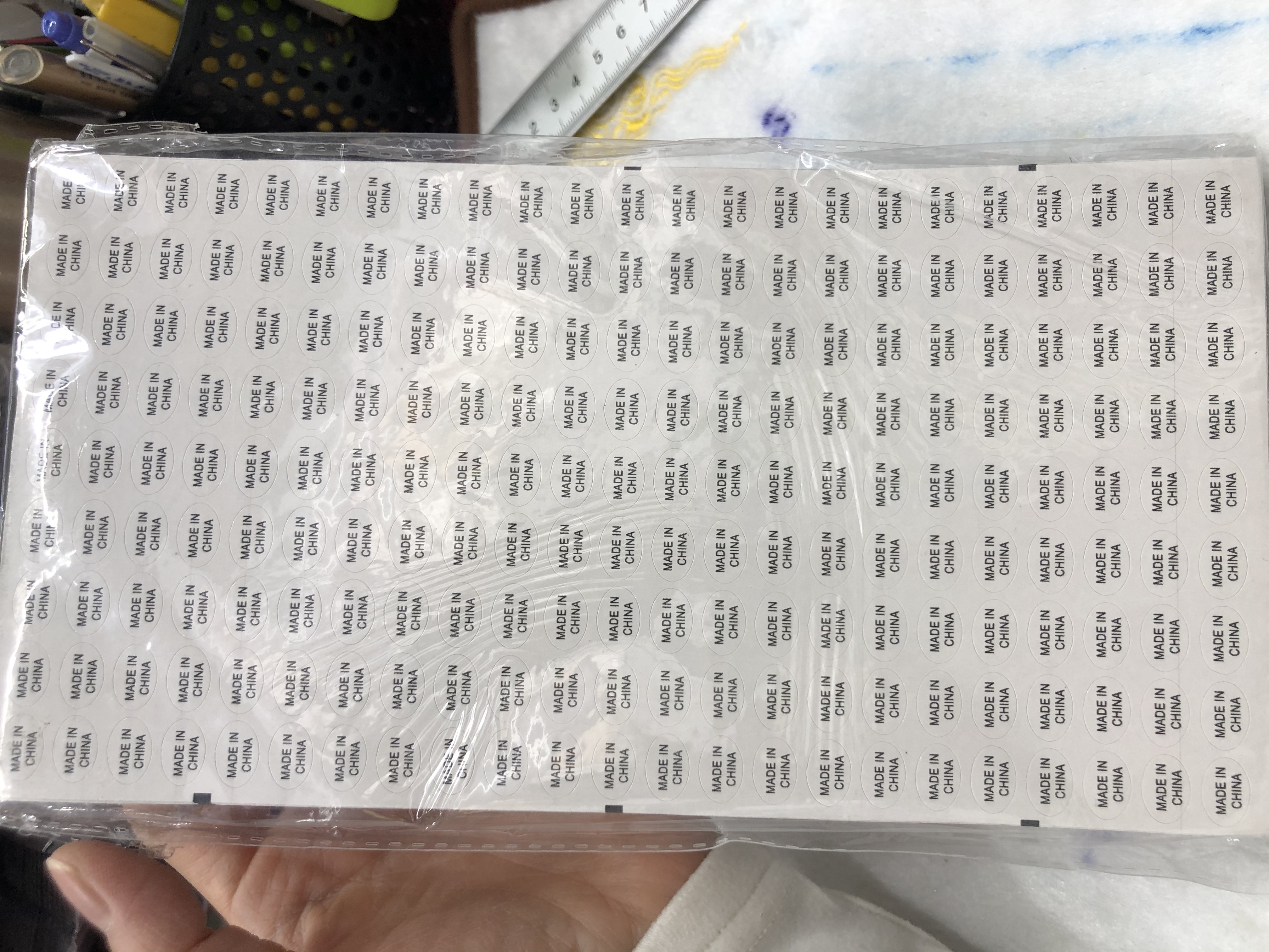 1.1*0.8白底黑字圆形不干胶印刷中国制造标签详情图1