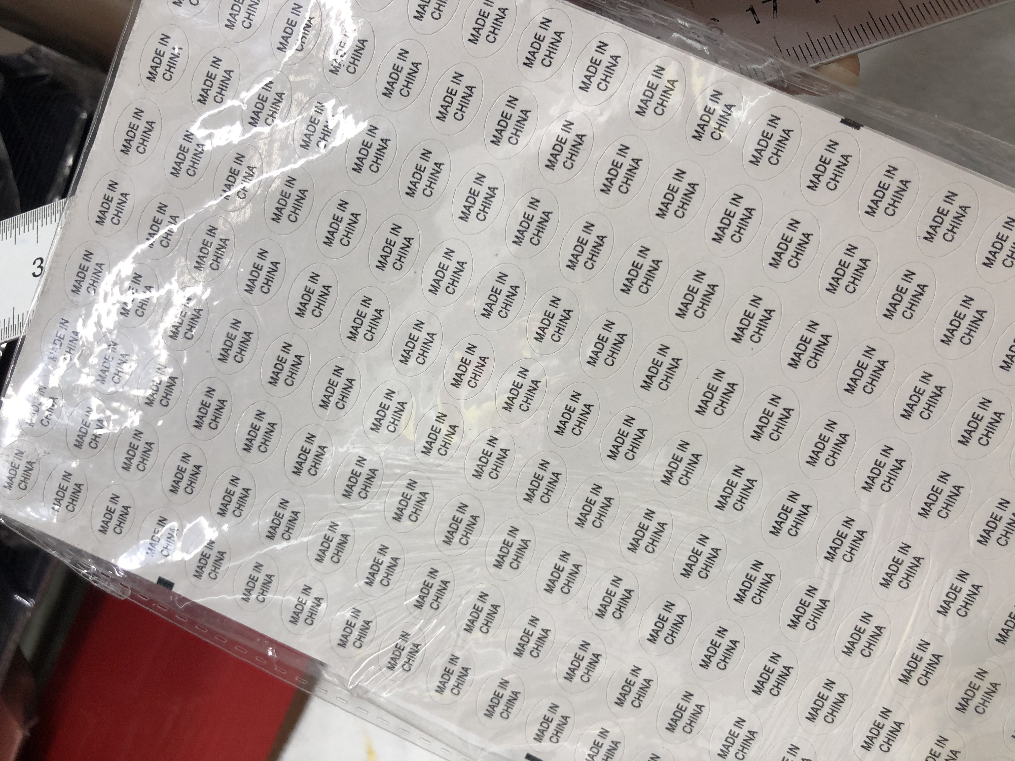 1.1*0.8白底黑字圆形不干胶印刷中国制造标签详情图5