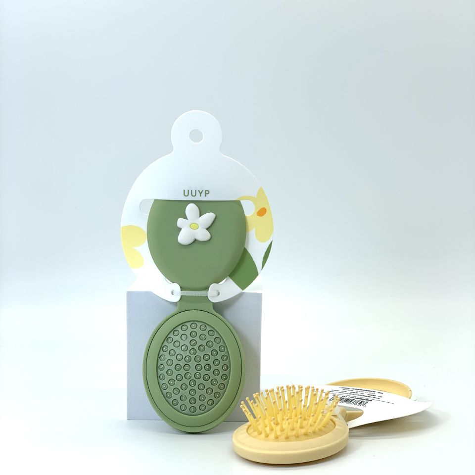 按摩带镜梳气垫弹性气囊梳子贵妇顺发负离子卷发梳印气垫梳详情图3