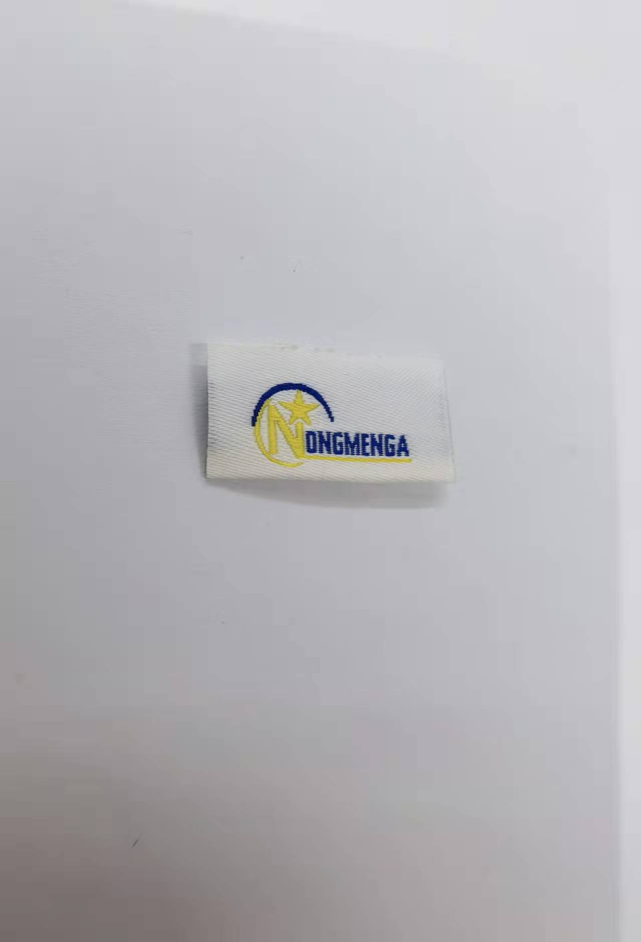 纺织辅料/水洗牌/加工细节图