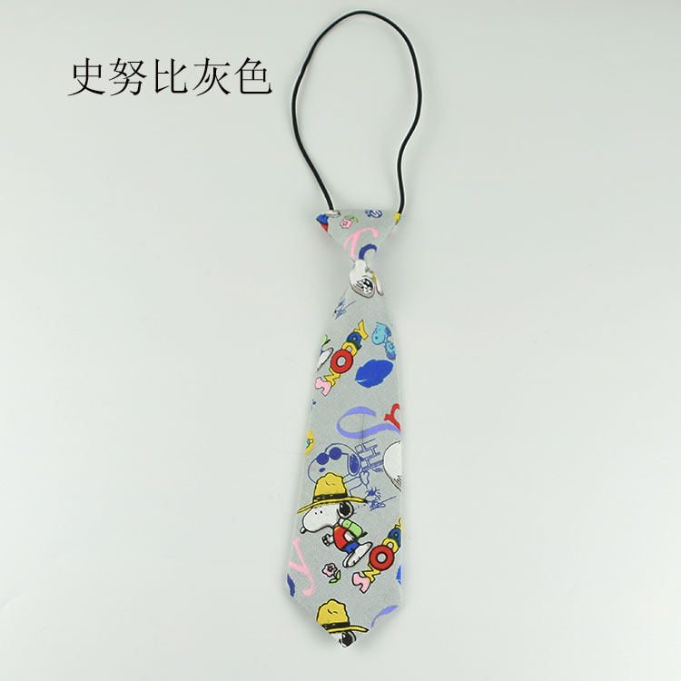 A woman with a small tie pairs it with a creative and fun cartoon canvas tie Specification image