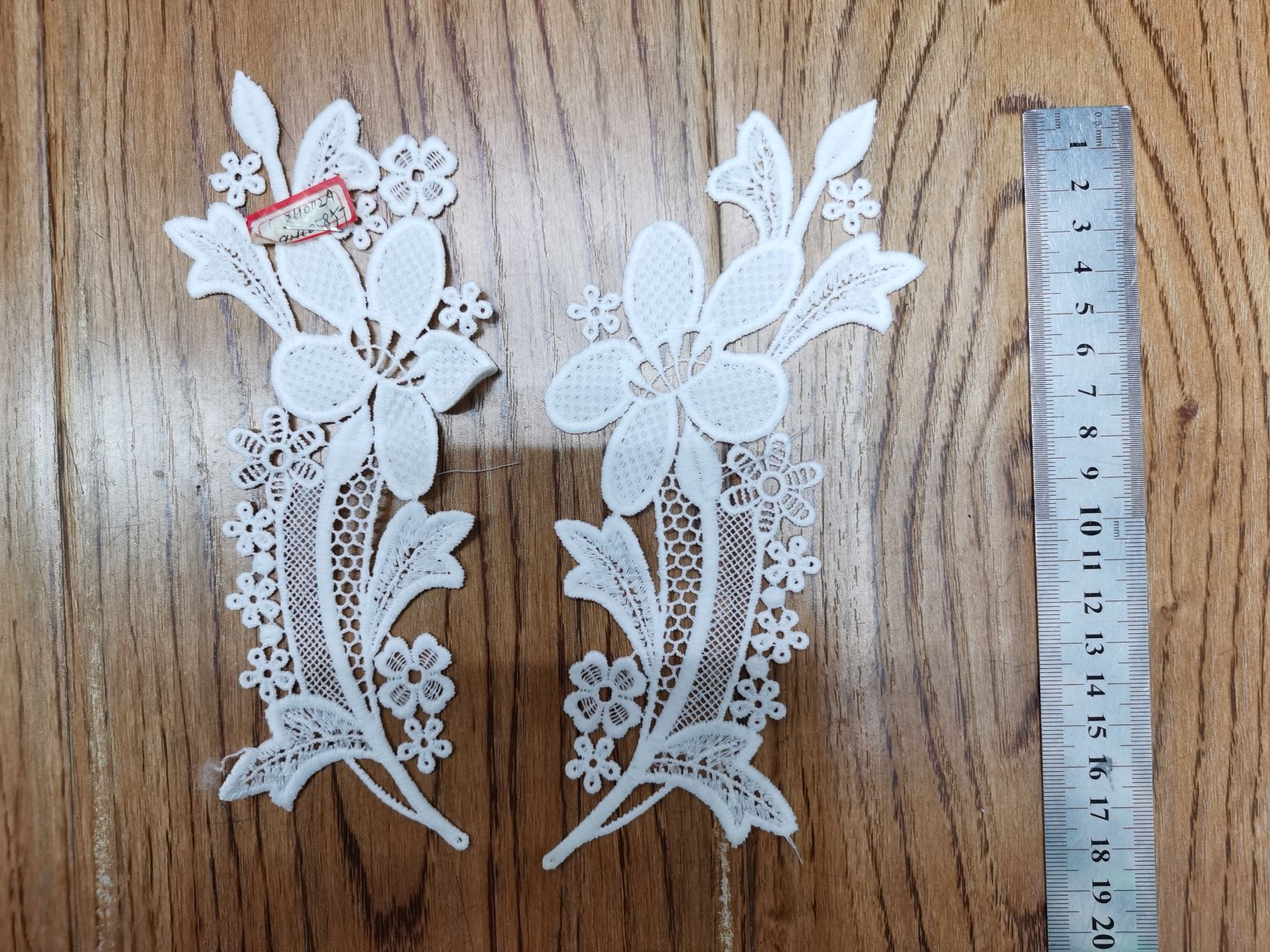 The front of the flower-patterned dress is decorated with floral patterns details Picture