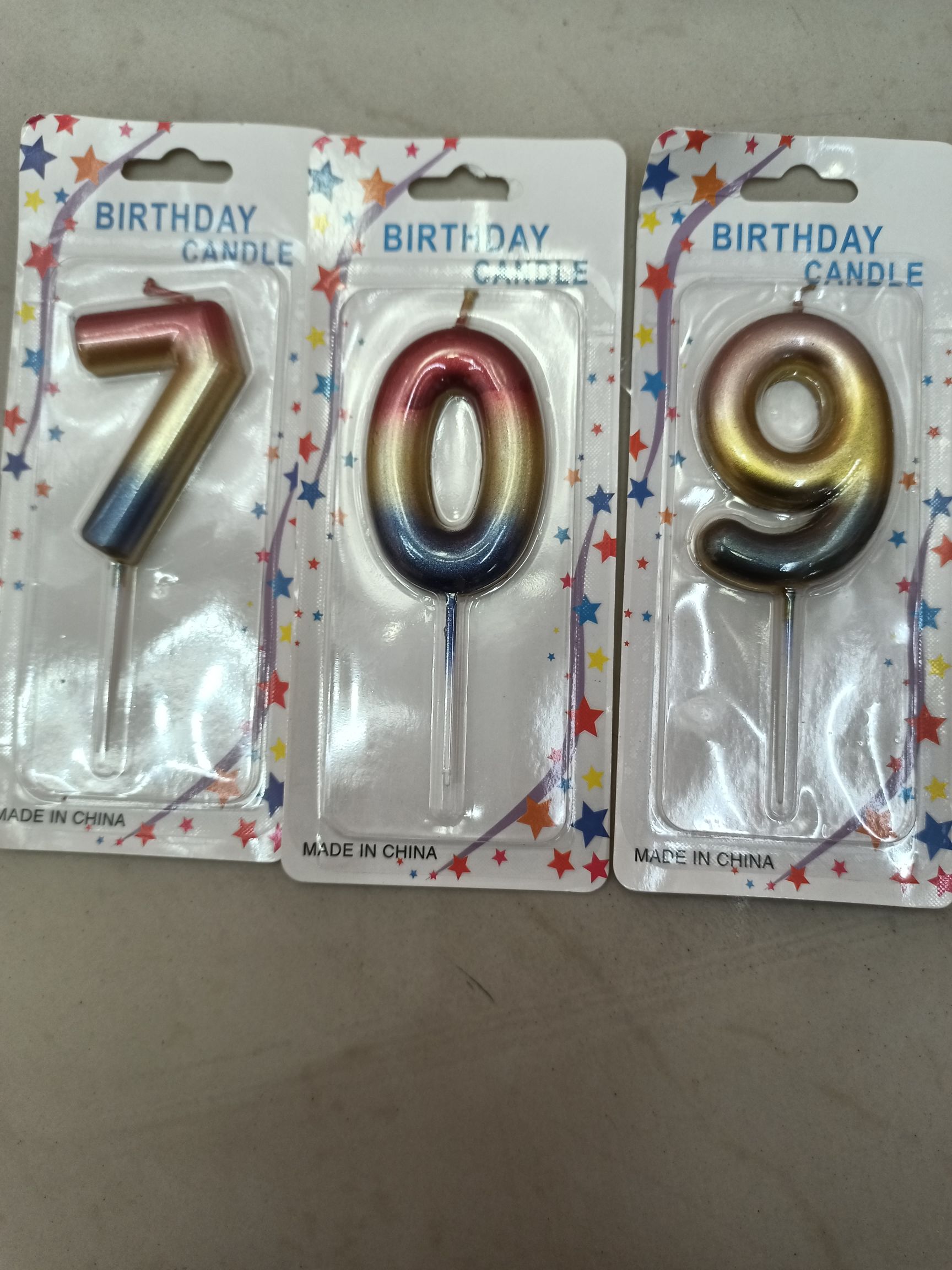 Birthday cake with numbers 0 to 9 and a galaxy gradient candle details Picture