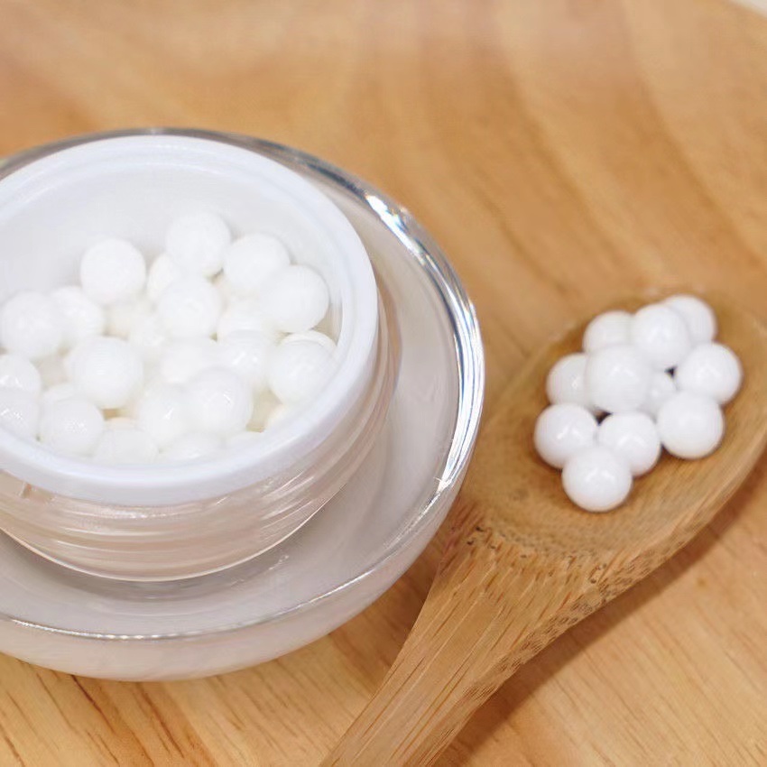 Close-up of Midseido Essence Filling Cream texture showing lightweight gel-cream formula