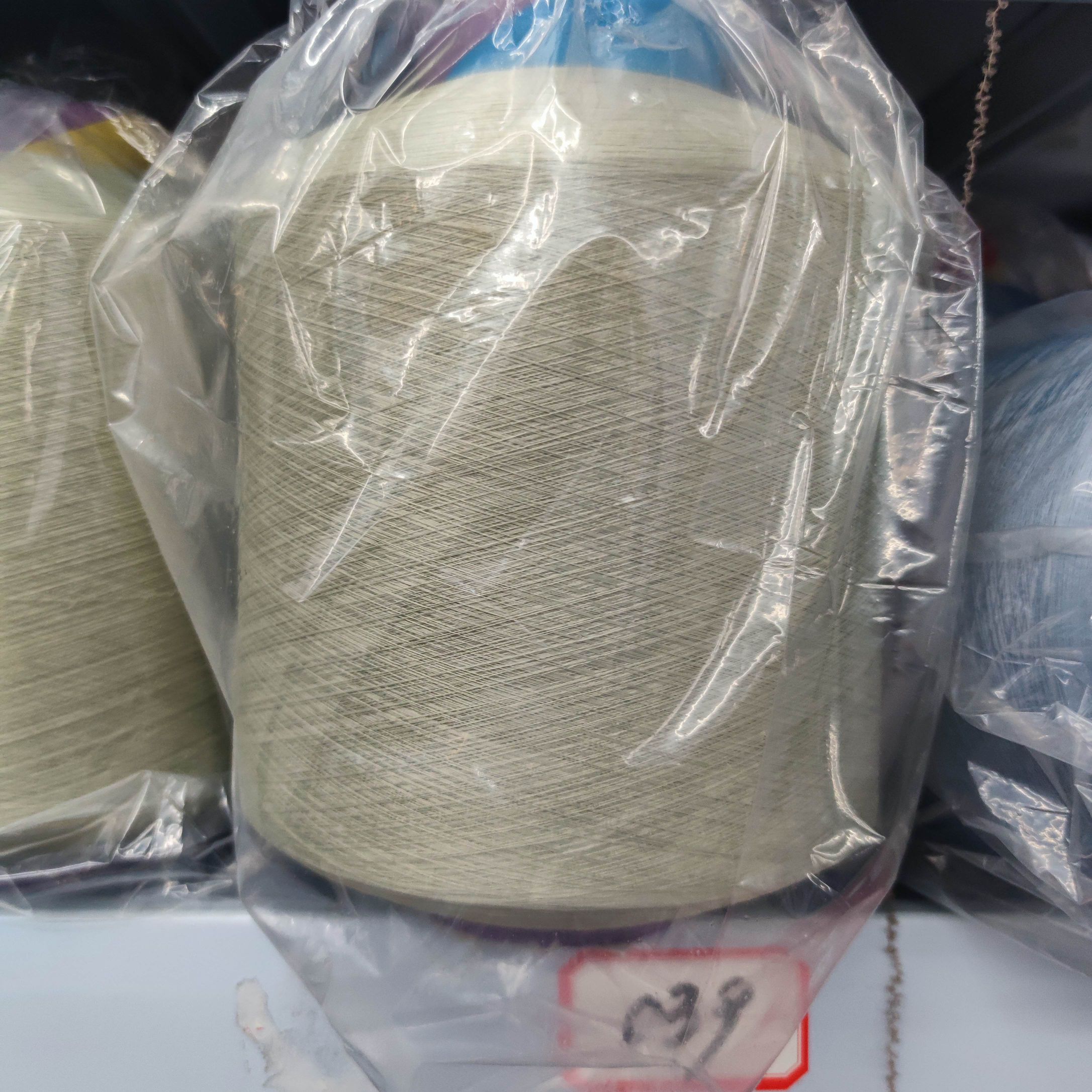 厂家直销 有色氨纶包纱彩色包覆纱039 纺织原料