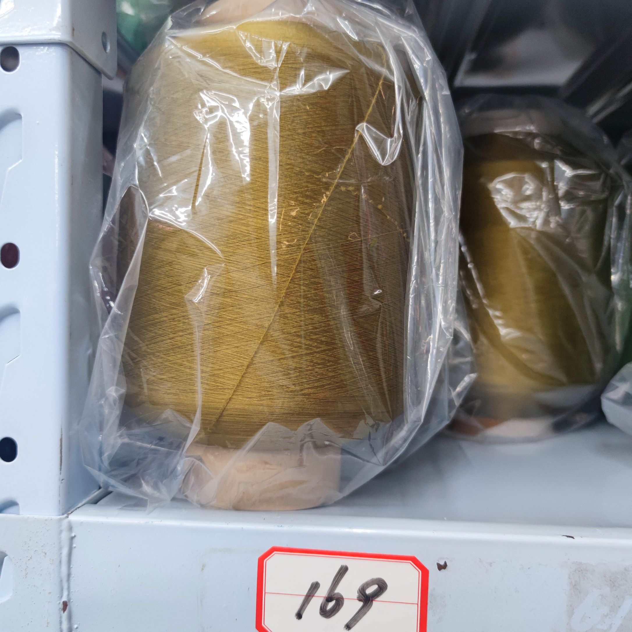 厂家直销 有色氨纶包纱彩色包覆纱169 纺织原料