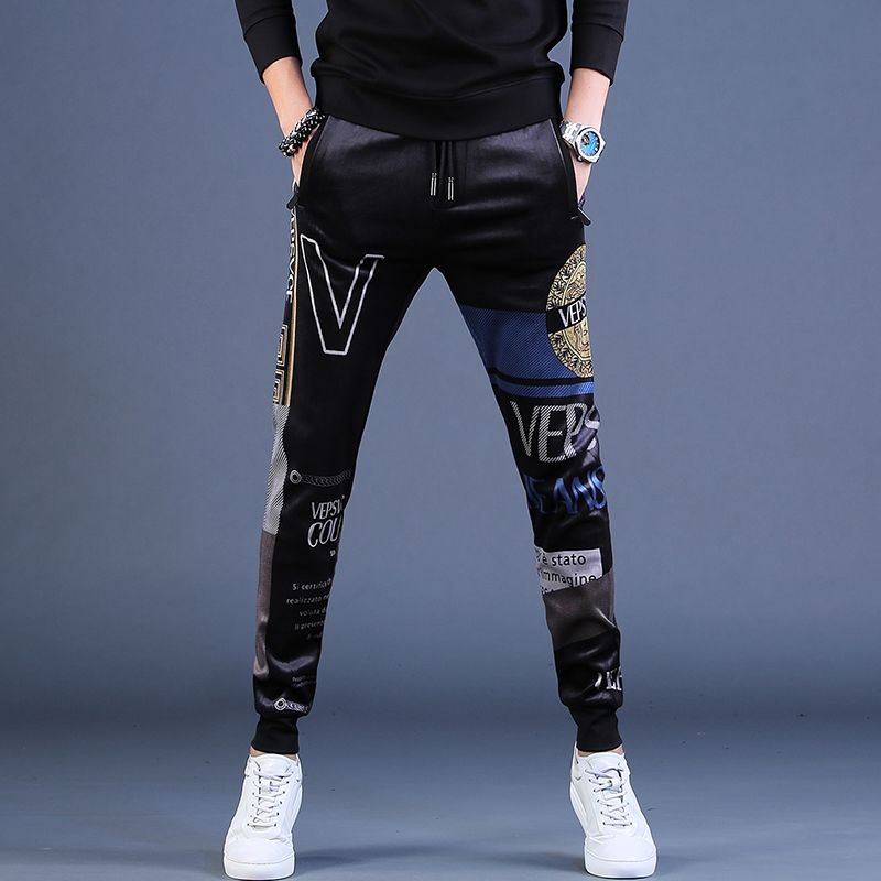 Marca de moda más terciopelo cordura pantalones casuales para hombres versión coreana pantalones de tendencia estiramiento slim bundles pies versátiles pantalones deportivos para hombres