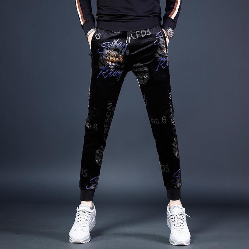 Pantalón de pana hombre otoño invierno grueso slim pantalón de pie pequeño hombre tendencia impresión bouquet pie pantalón deportivo negro Item Picture