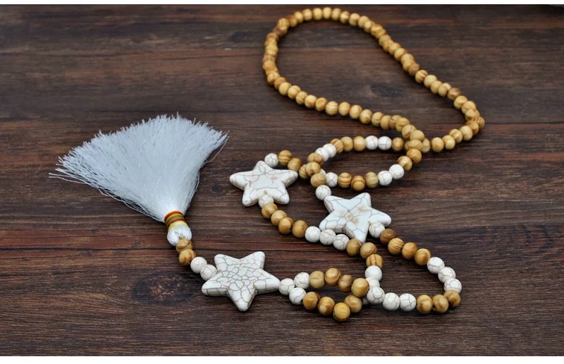 Handmade Bohemian-style long necklace and sweater chain with wooden beads and five-pointed stars details Picture