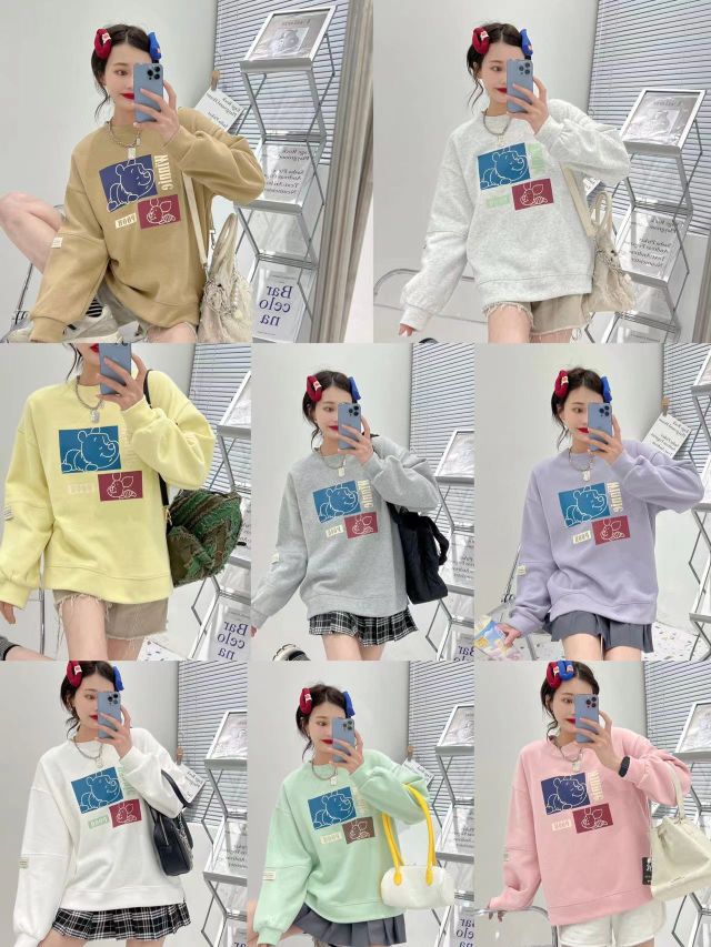 The side-slit round-neck hoodie with a loose hem is a thin and fashionable top for women's early spring in 2022 detail image 1