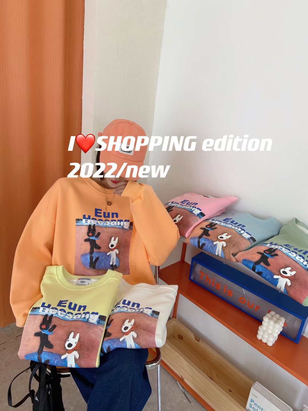A new style of loose women's hoodie with cartoon print design detail image 2