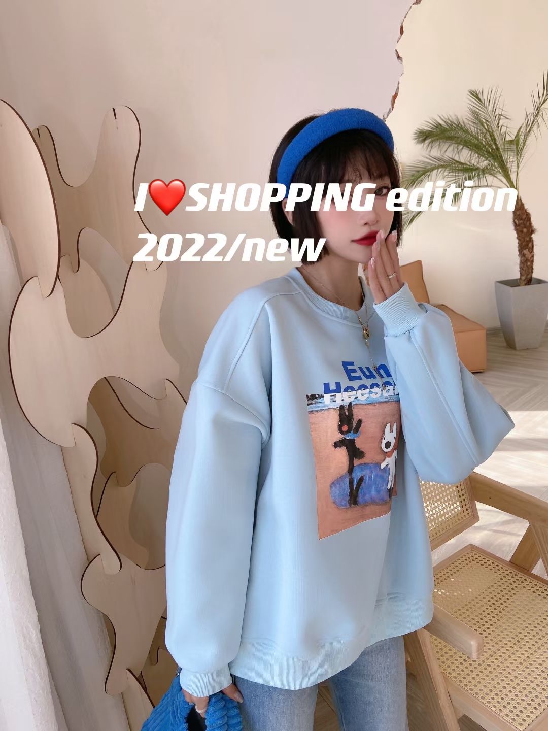 A new style of loose women's hoodie with cartoon print design Specification image