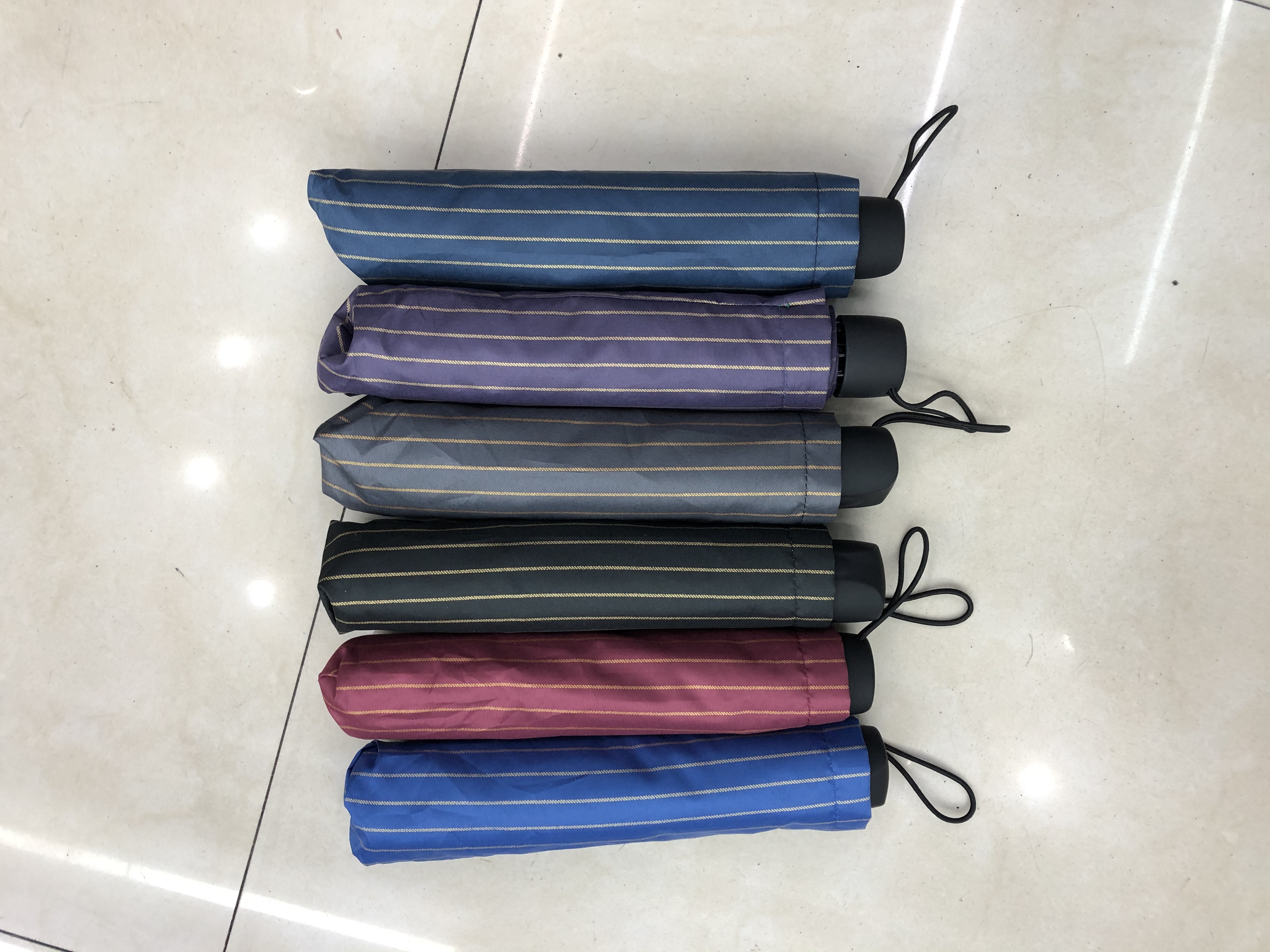 三折喷漆布条纹伞