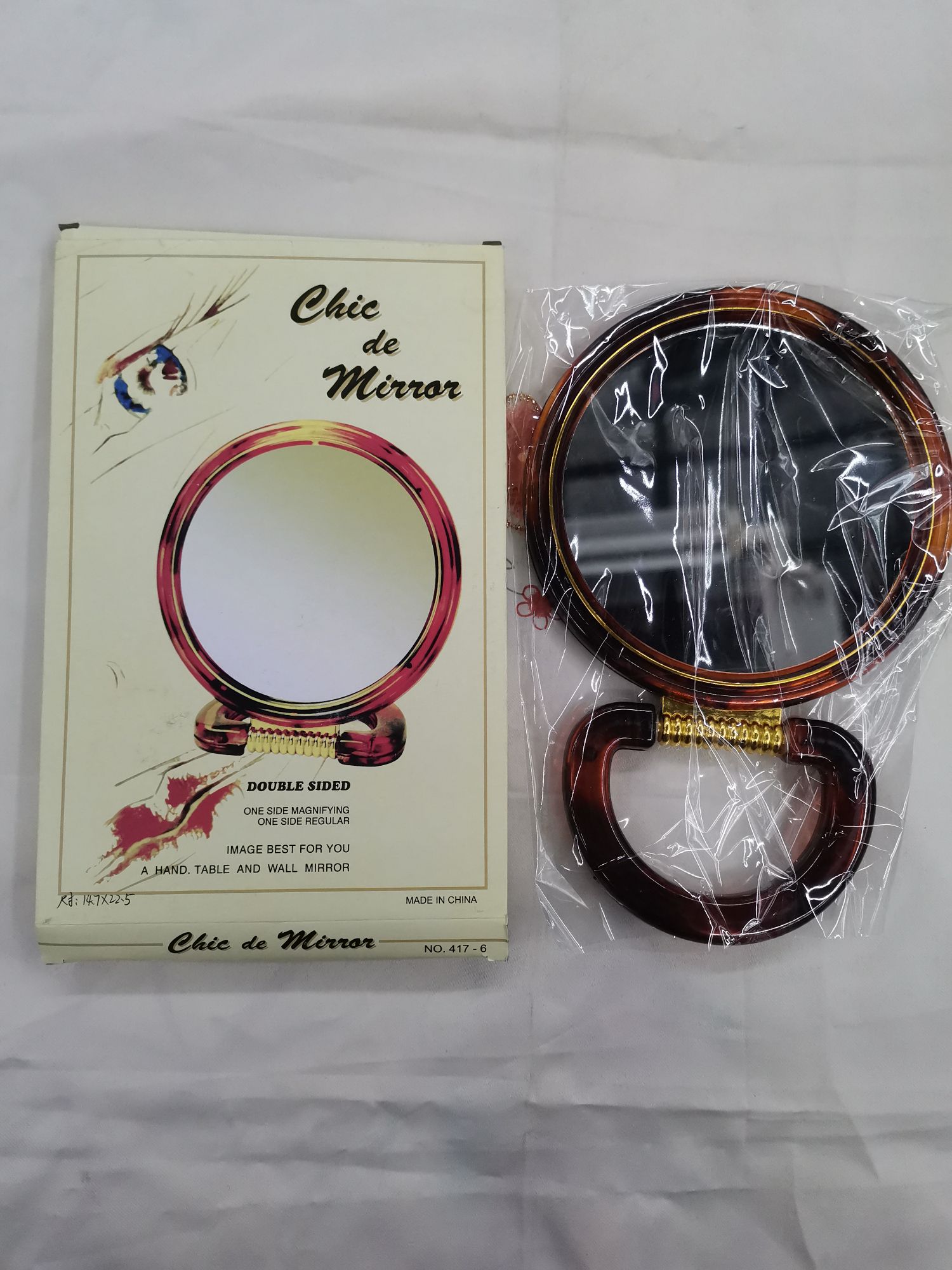 417/6镜子，一个一彩盒子包装，一色颜色。72个每箱，体积，42*24*50。产品尺寸长8*16.3