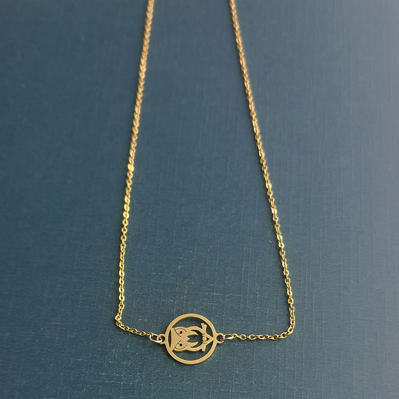 Simple round titanium steel pendant, hollowed-out stainless steel owl bracelet pendant, precisely cut golden steel color accessory Item Picture