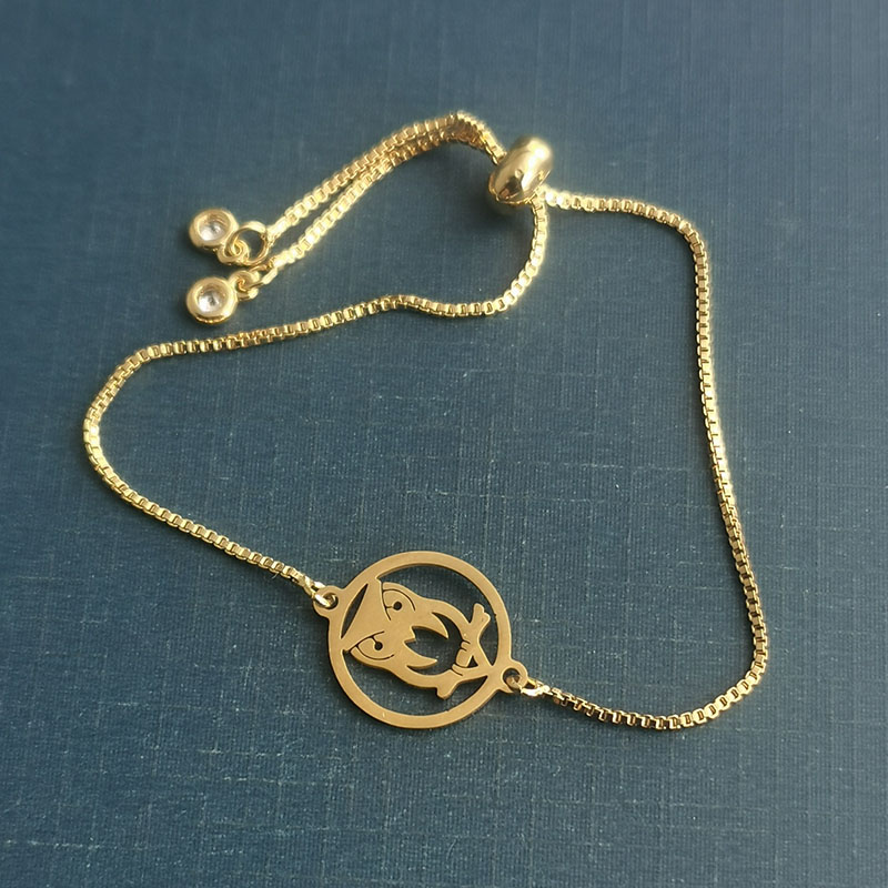 Simple round titanium steel pendant, hollowed-out stainless steel owl bracelet pendant, precisely cut golden steel color accessory Application Scenario