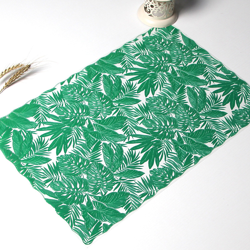 Wholesale of European-style pvc decorative placemats, gold-embossed placemats, leaf-shaped printed hollowed-out heat-insulating placemats details Picture