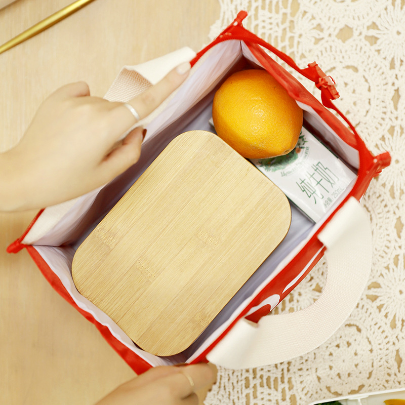 The new lunch hand-held bento bag features a simple ribbon ice pack and is made of waterproof Oxford fabric. It is suitable for office workers and students to carry Specification image