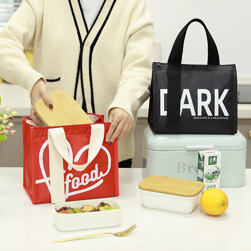 The new lunch hand-held bento bag features a simple ribbon ice pack and is made of waterproof Oxford fabric. It is suitable for office workers and students to carry details Picture