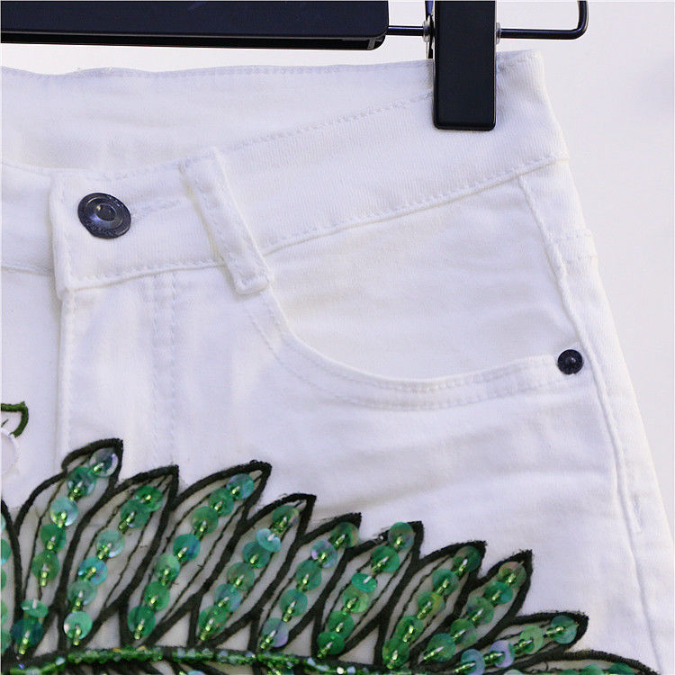 European Station 2022 Summer New leaf sequined beaded fringed denim shorts Women's fashion floral slimming hot pants detail image 8