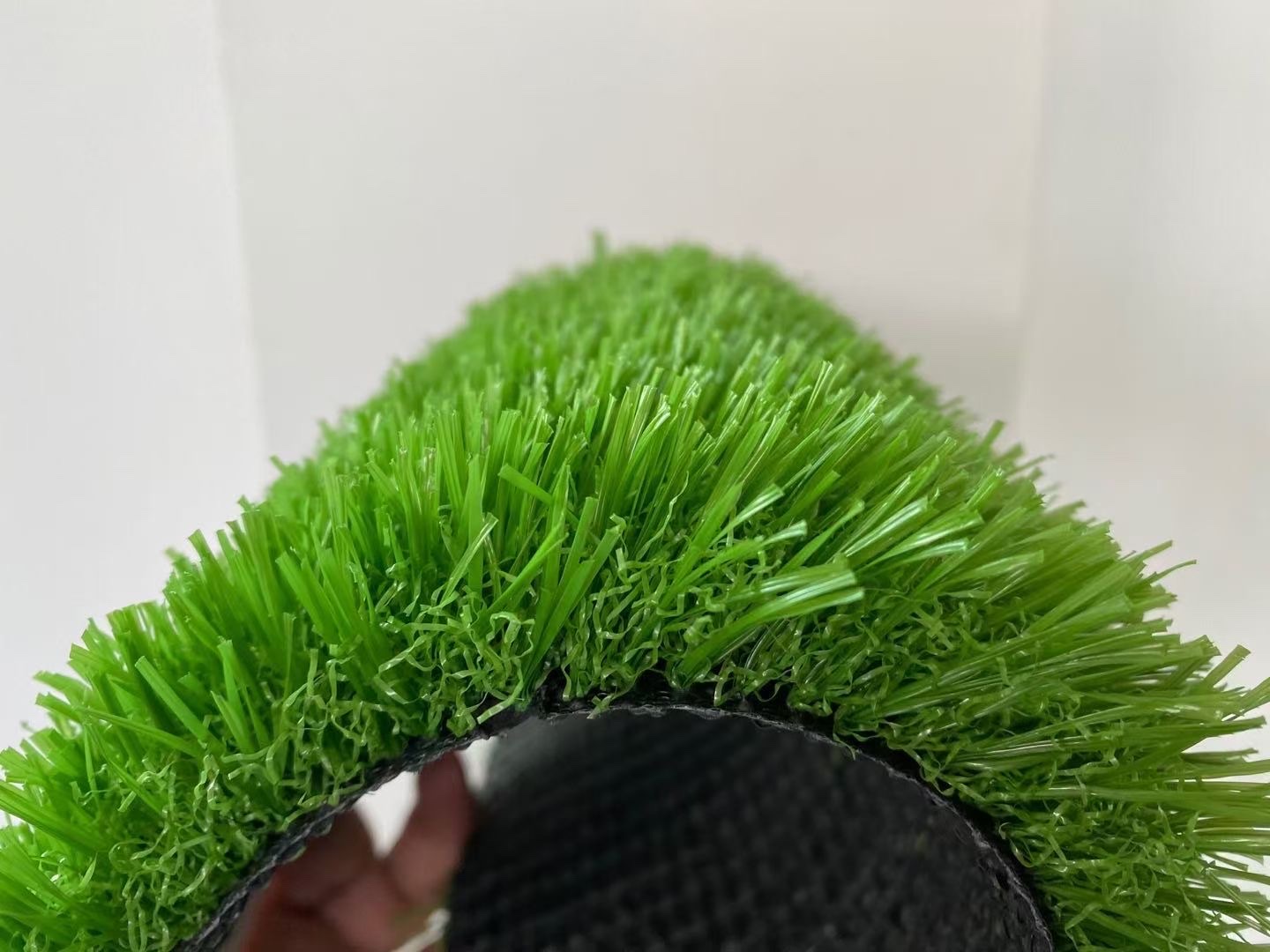 Artificial turf, simulated sports turf, artificial turf, plastic turf, outdoor decorative football turf, kindergarten fences, artificial turf details Picture