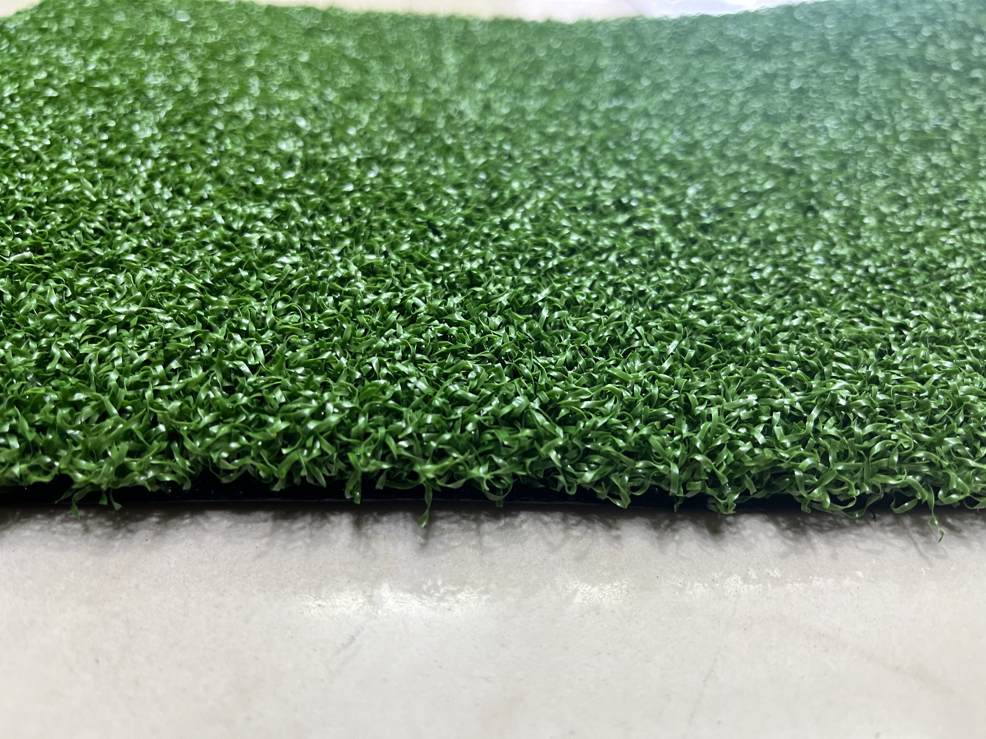 Artificial turf, golf turf, croquet turf, sports turf, artificial plastic, outdoor decoration, putting greens, hotel turf, kindergarten fences, artificial turf details Picture