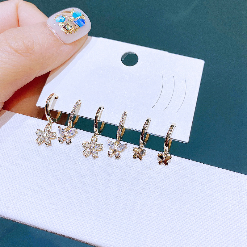 A new cross-border European and American earring set, featuring exquisite and fashionable zircon flower butterfly ear loops and ear rings in three pairs details Picture