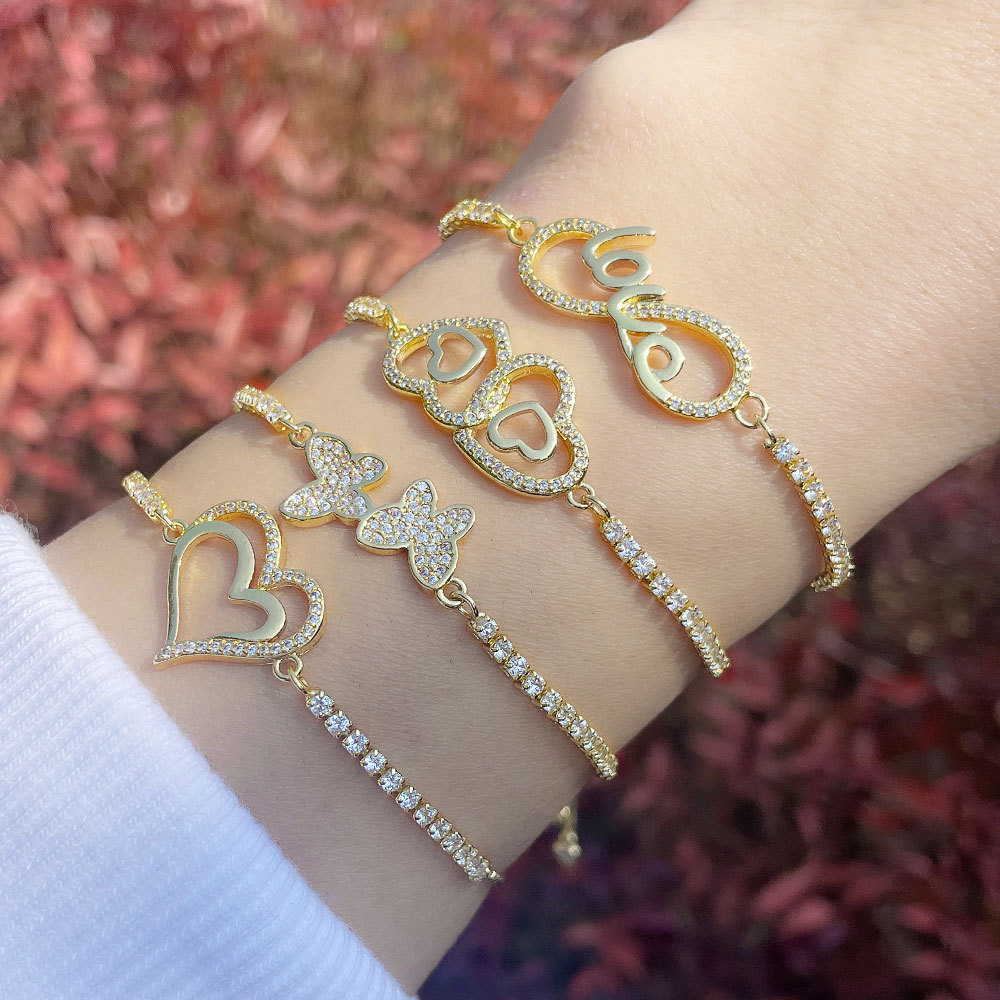 A retro diamond-encrusted heart-shaped bracelet with a unique European and American style. It features an Instagram niche design with the letter "love" for women