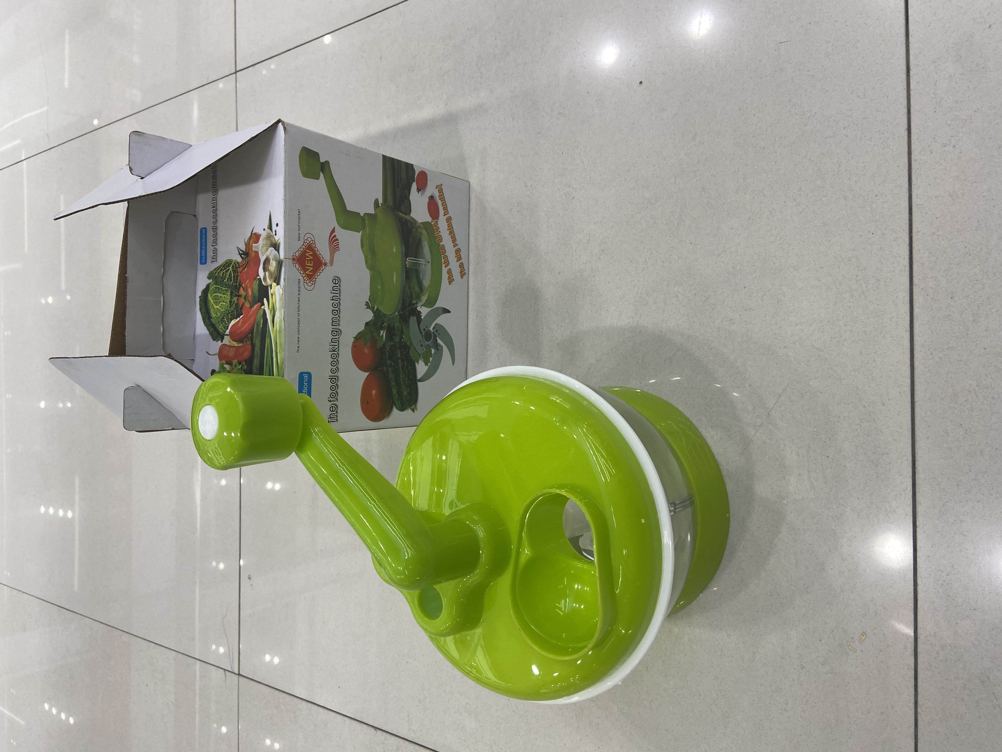 Green hand-cranked vegetable cutter details Picture