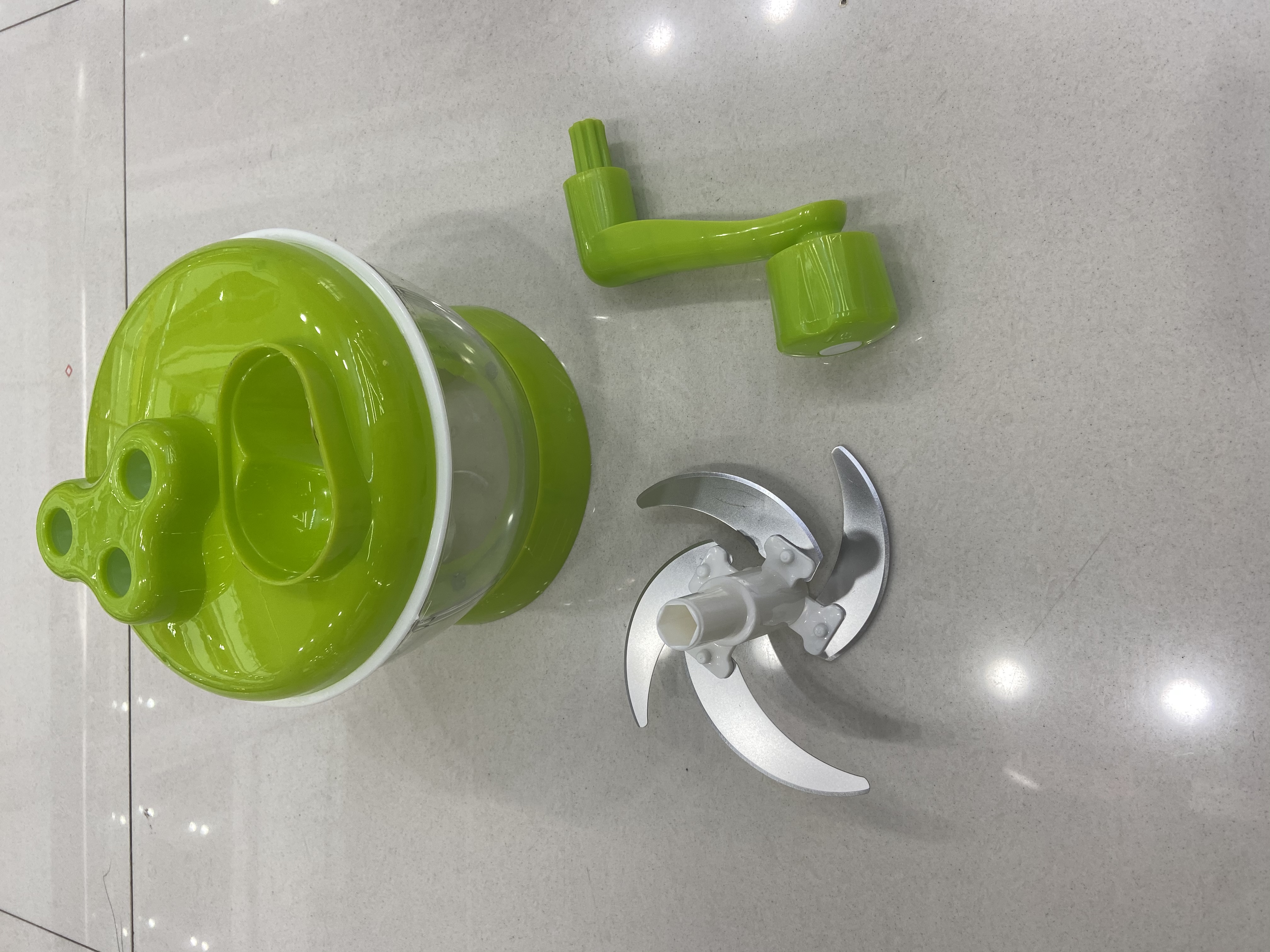 Green hand-cranked vegetable cutter Item Picture