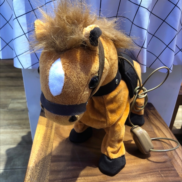 The new internet-famous best-selling electric plush toy, the brown horse with a leash that can walk and play music, is from the brand HNR419 details Picture